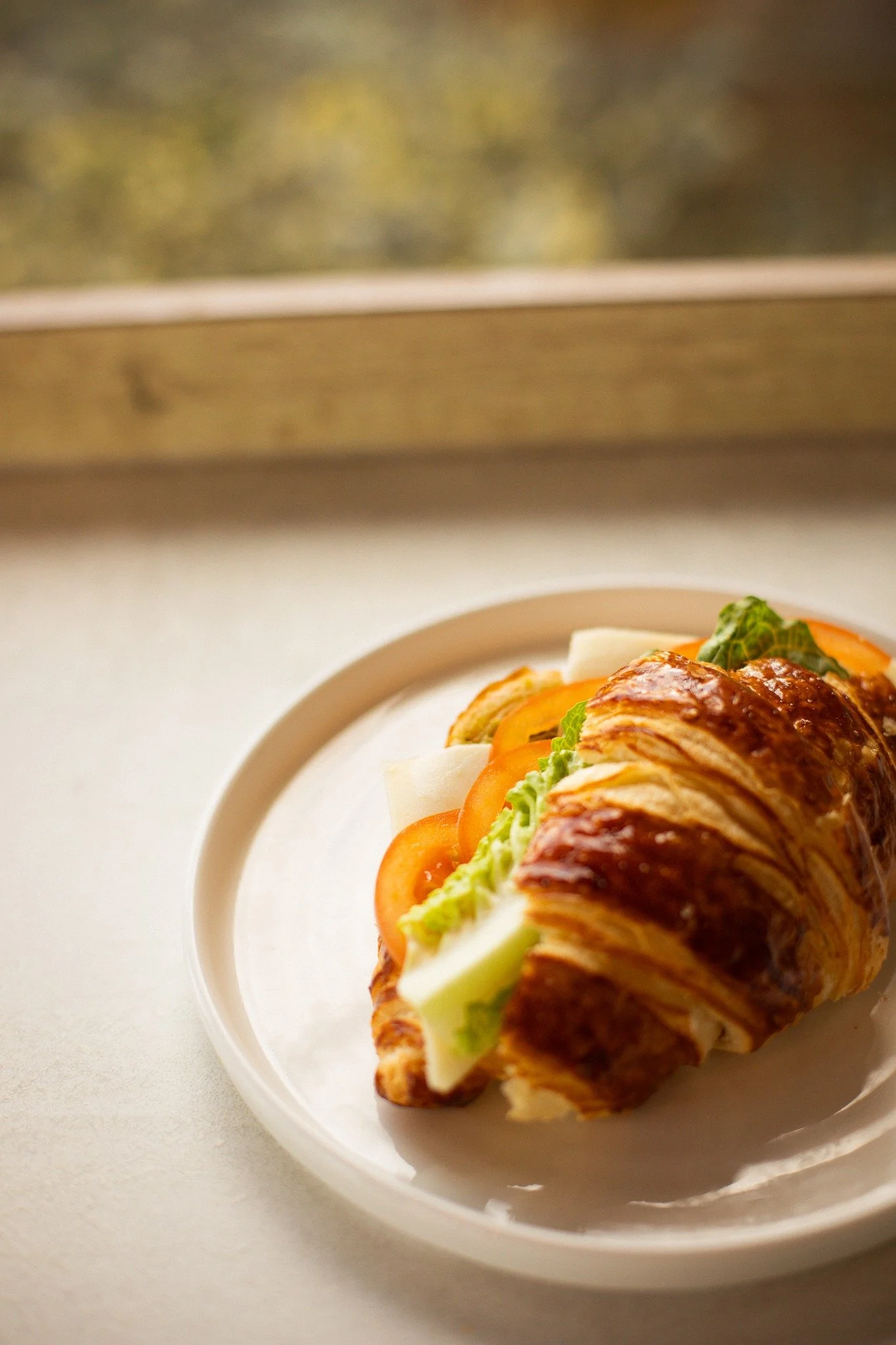 This croissant deserves its own fan club 🥐

Mozzarella, pesto &amp; tomato in a warm flaky croissant.

#CroissantMood #FoodieFinds #FreshAndFlaky #PestoPerfection