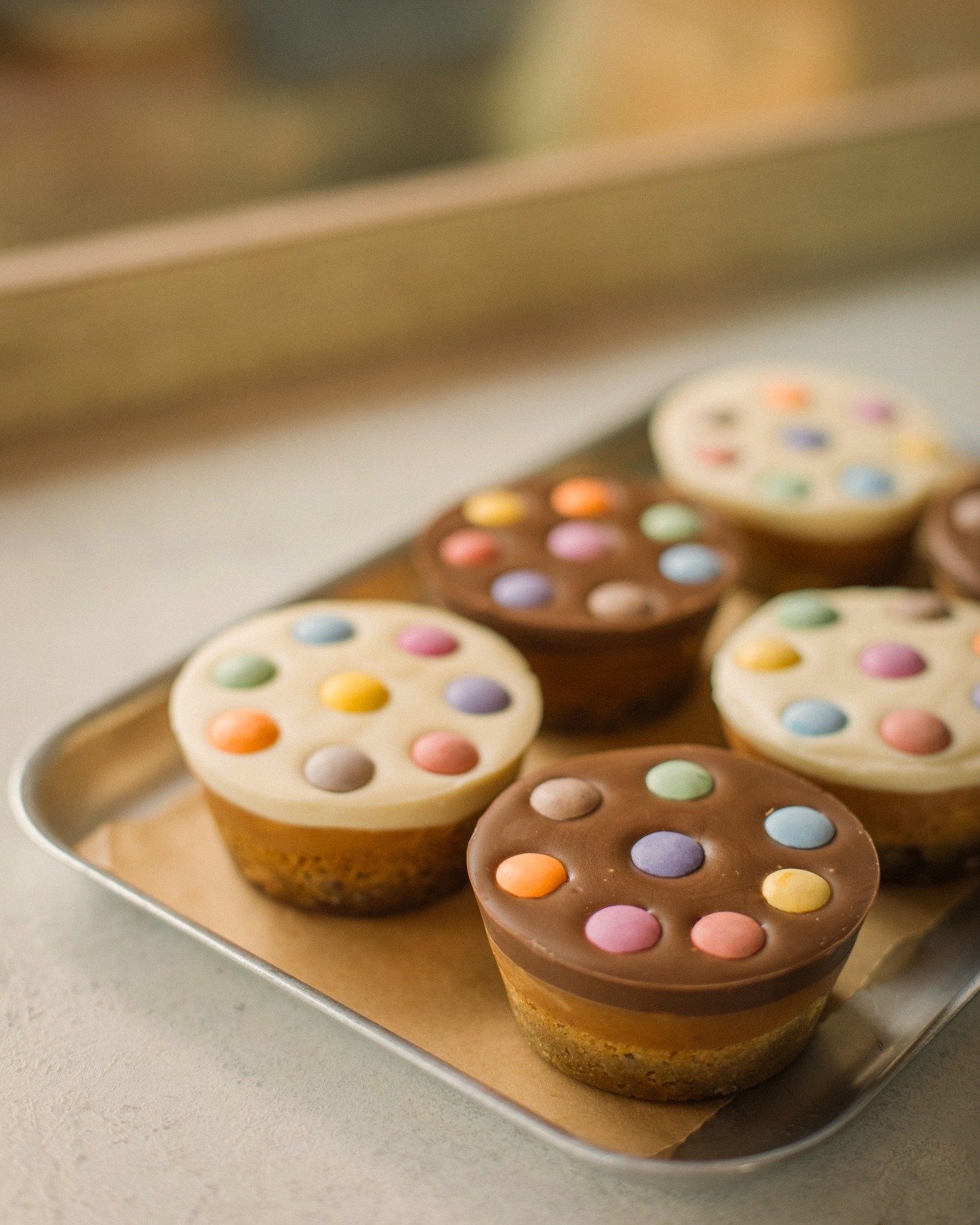 Today&rsquo;s counter lineup looking extra colourful 🌈🍪

Featuring our Smarties cookie millionaire bringing all the chocolatey nostalgic energy today.

#CounterTreats #RainbowBakes #SweetTooth #CookieMillionaire