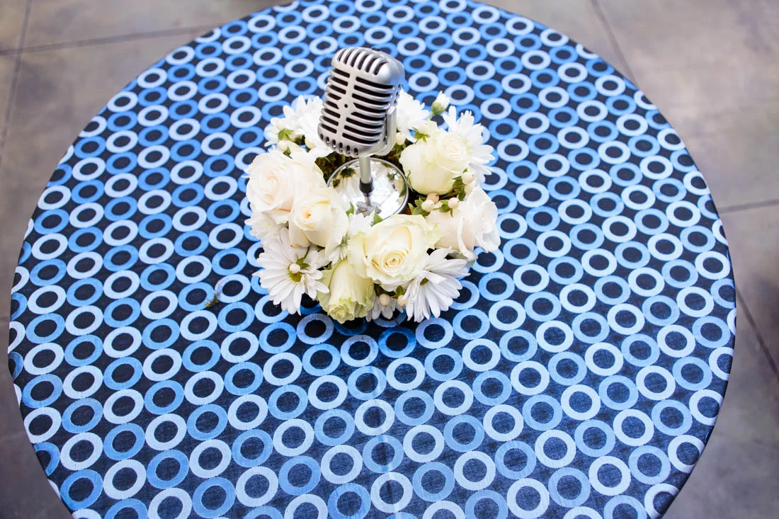 blue linen, linen with blue circles, microphone centerpiece, circled pattern table linen