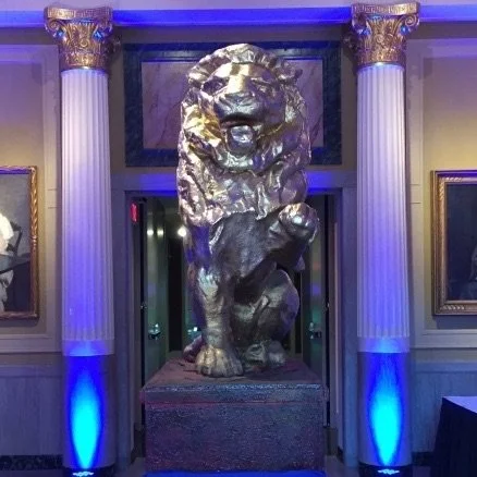 Gold Lion on Pedestal.jpeg