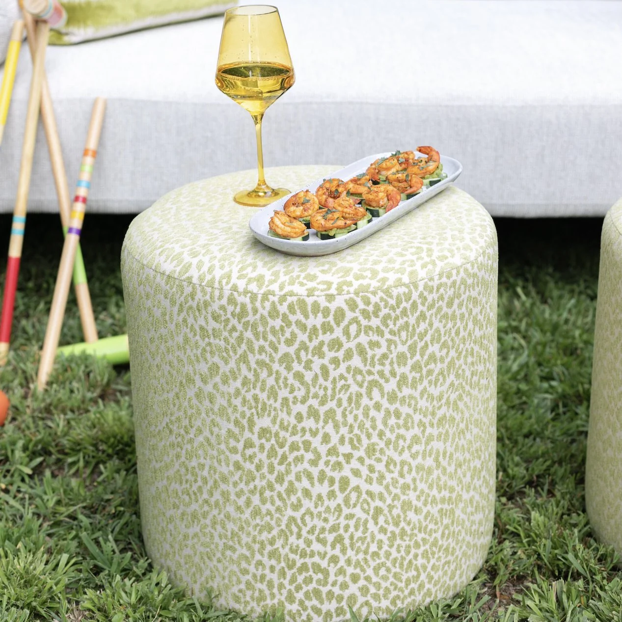 jasper kiwi cheetah ottoman.jpg