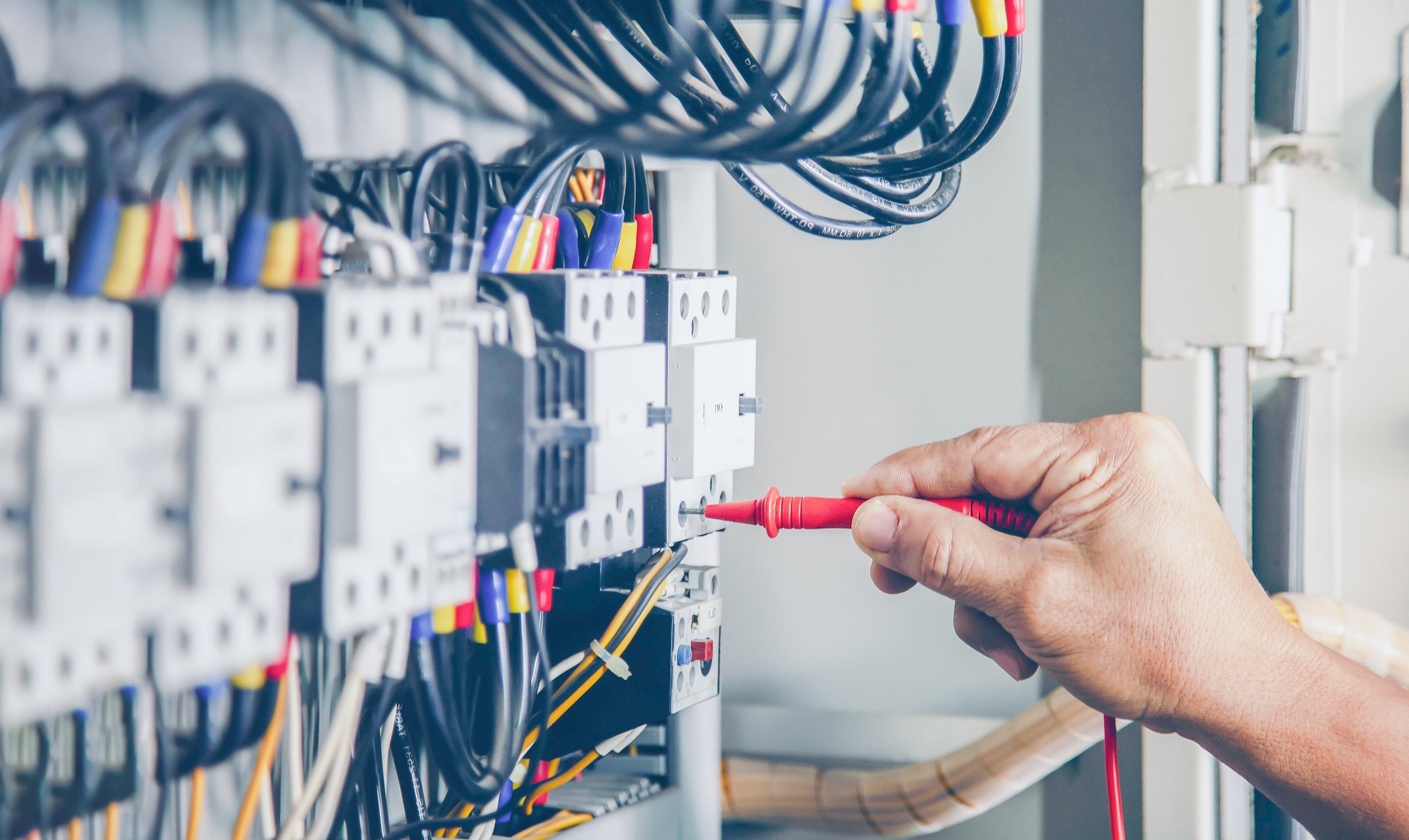electrical-engineer-checking-operation-electrical-control-cabinet-maintenance-concept.jpg