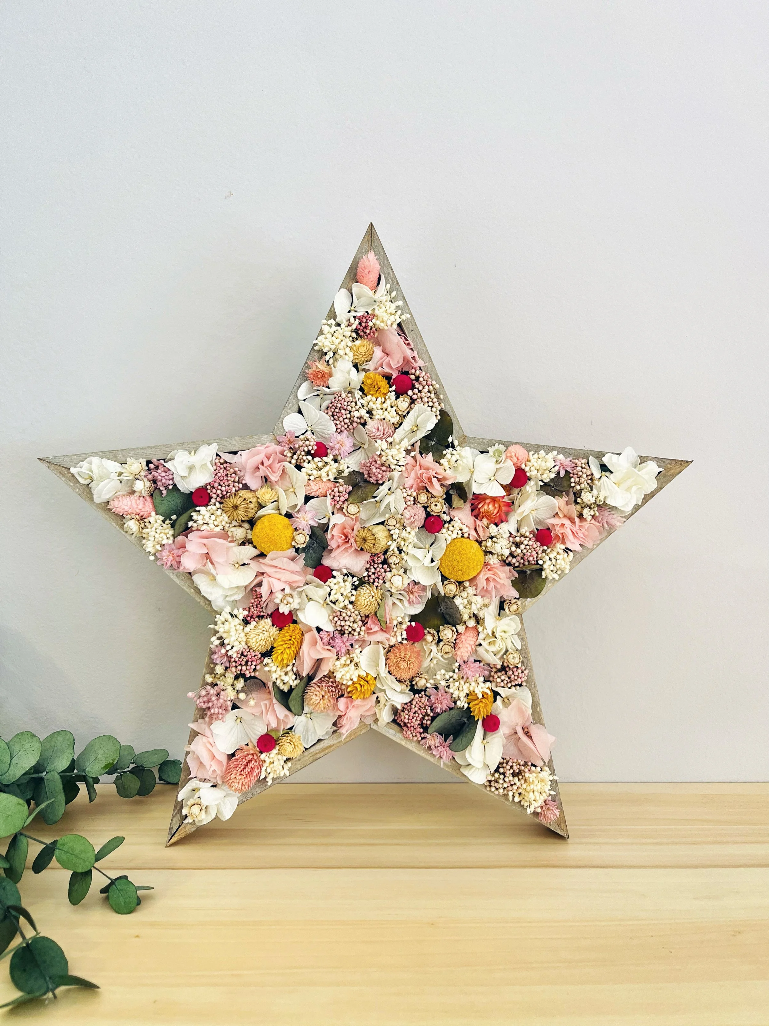 estrella de flores preservadas