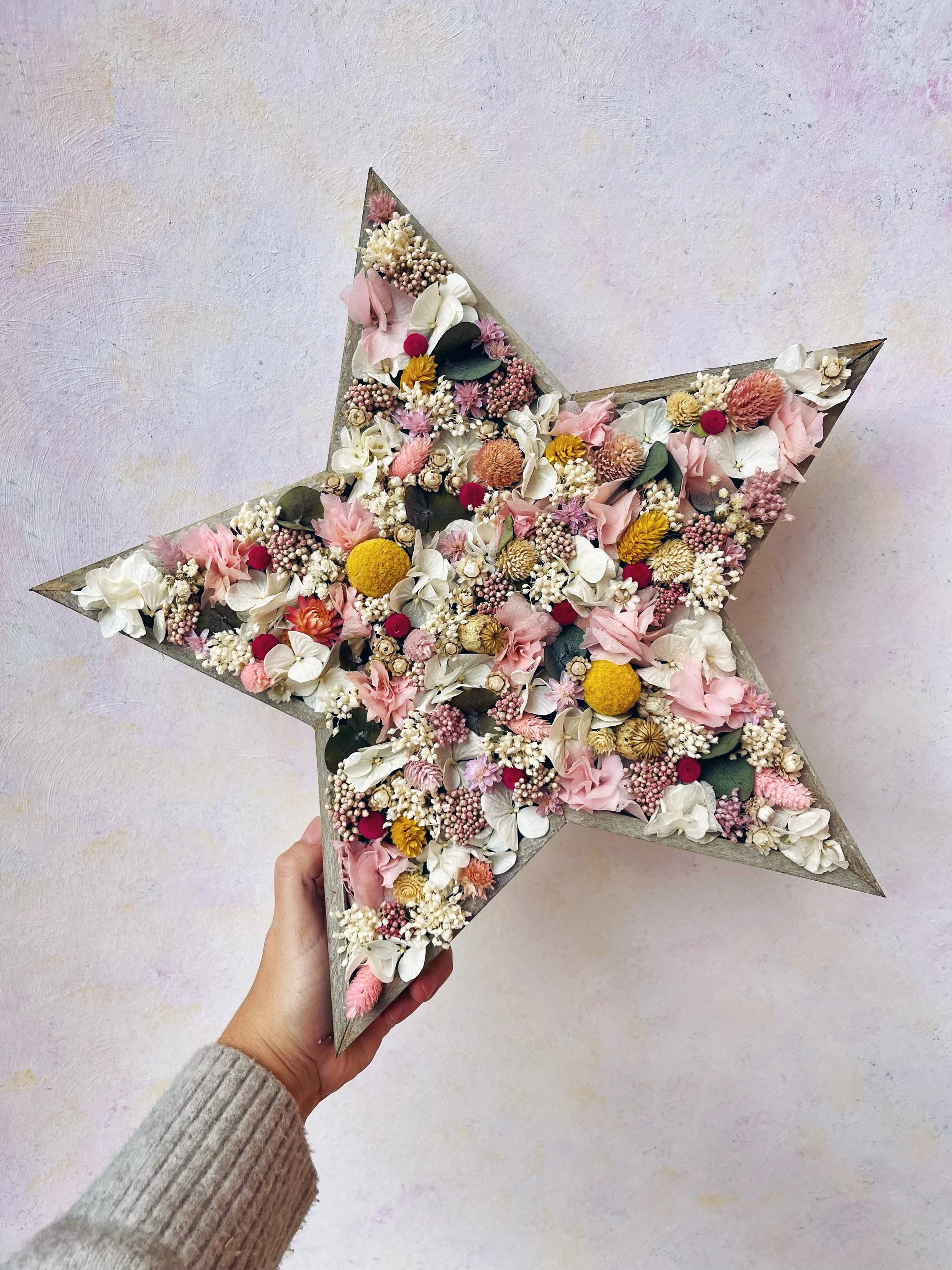 estrella de flores preservadas