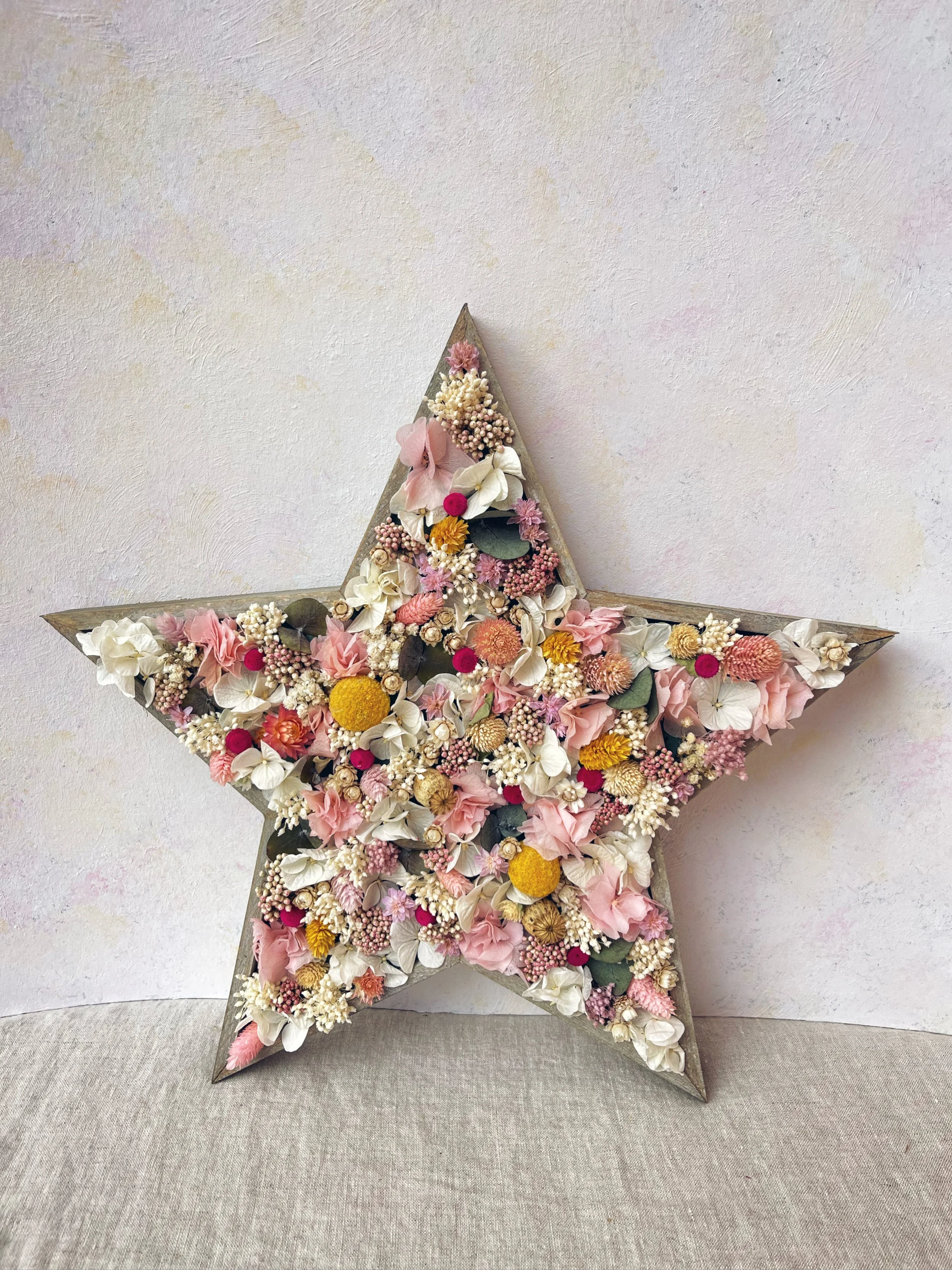 estrella de flores preservadas