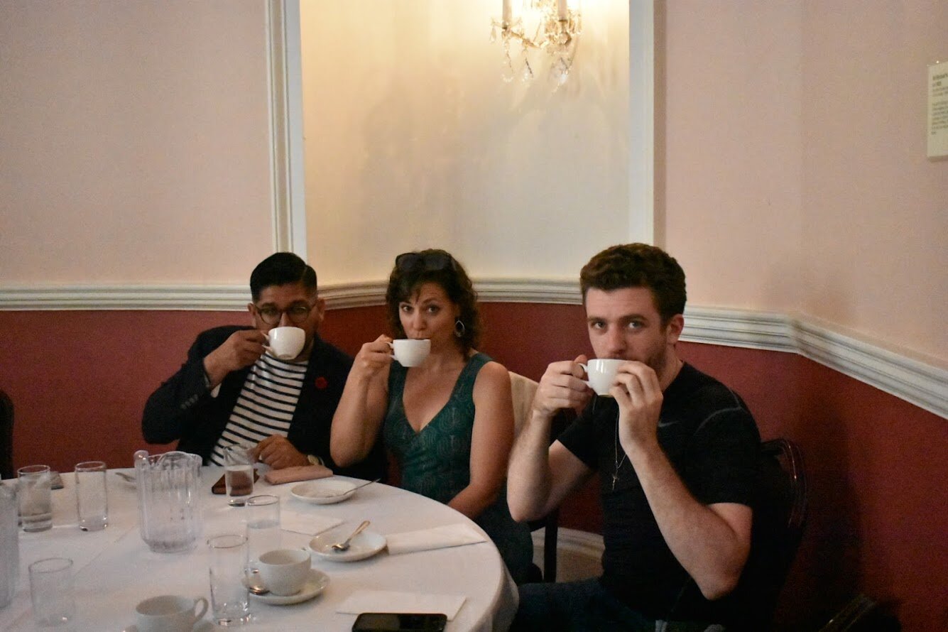 Zain Shariff (l), Katie Jagielski (c), Ryan Davis drinking tea, Bath (photo: Rachel Tester)