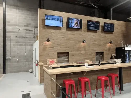 seating area complete with television receptacle wiring as well as data wiring to each location. fridge wiring located behind kitchen for keg/beer storage.