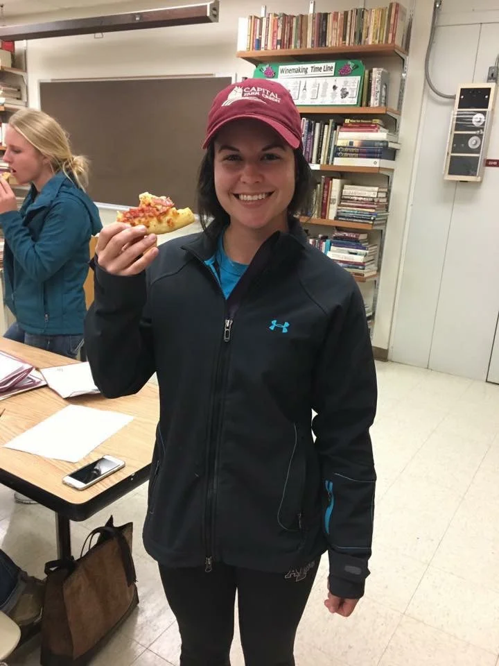 Hailey doing her best to earn a Pizza Sponsorship. Nom Nom! (Shout out to Whitney Thurmond in the background!)