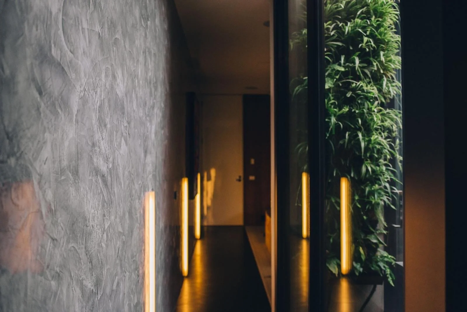 textured-wall-finish-hallway-integrated-lighting-interior-design.JPG