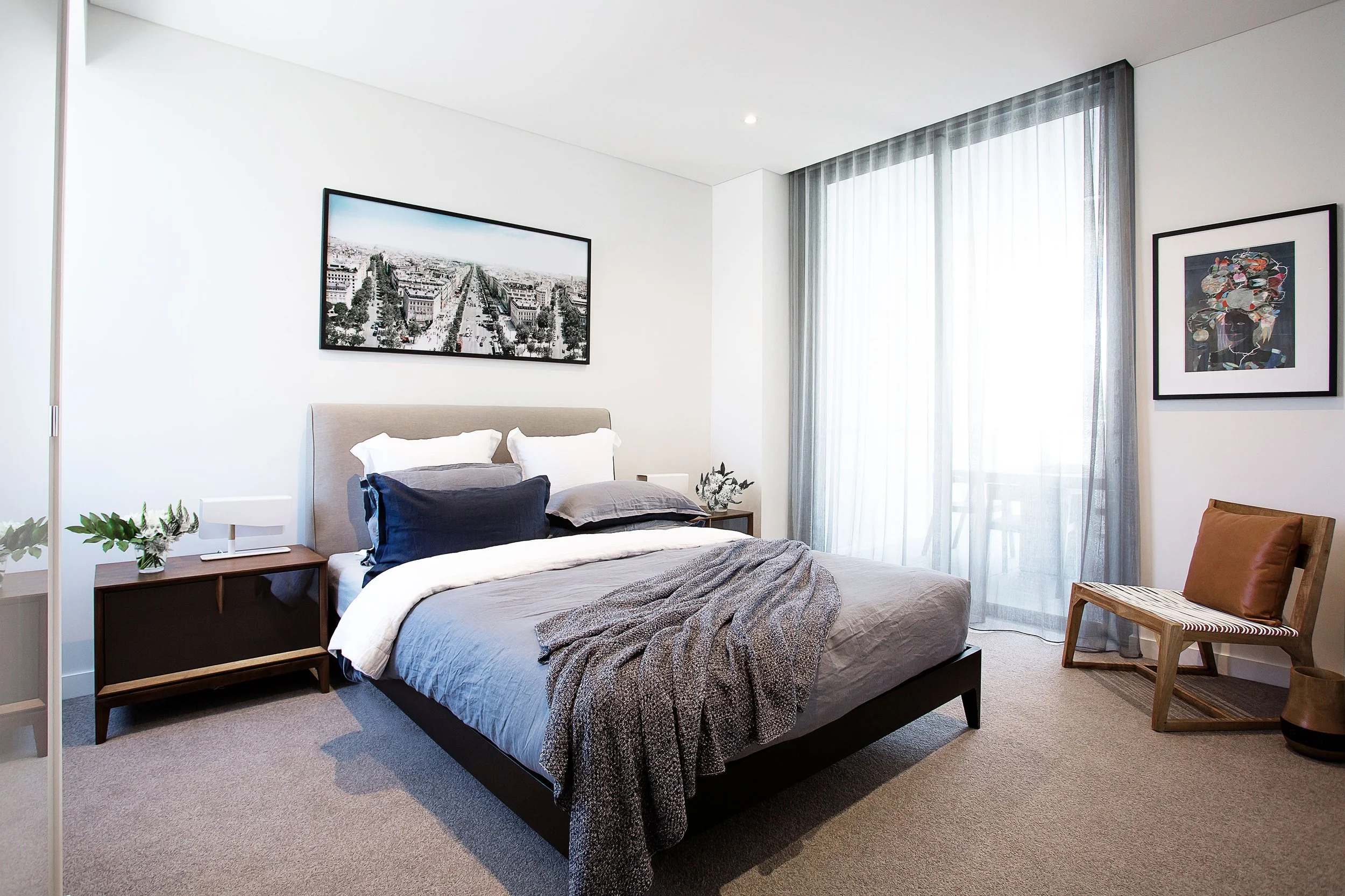 Bedroom styling detail showing bedside furniture, artwork and calm neutral palette in a Mirvac townhouse