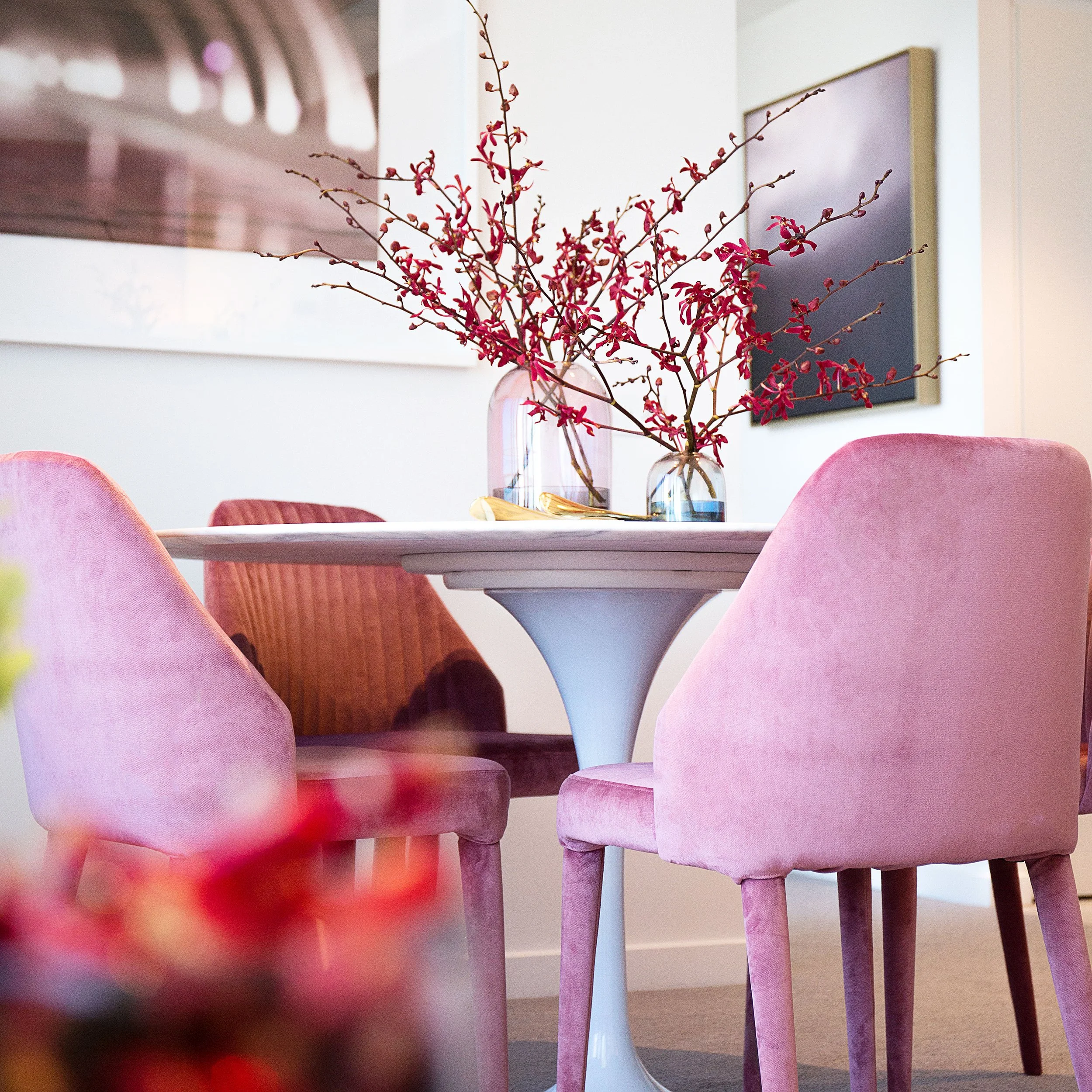 Dining table styling detail with decorative accessories in Forge Docklands apartment 1057.
