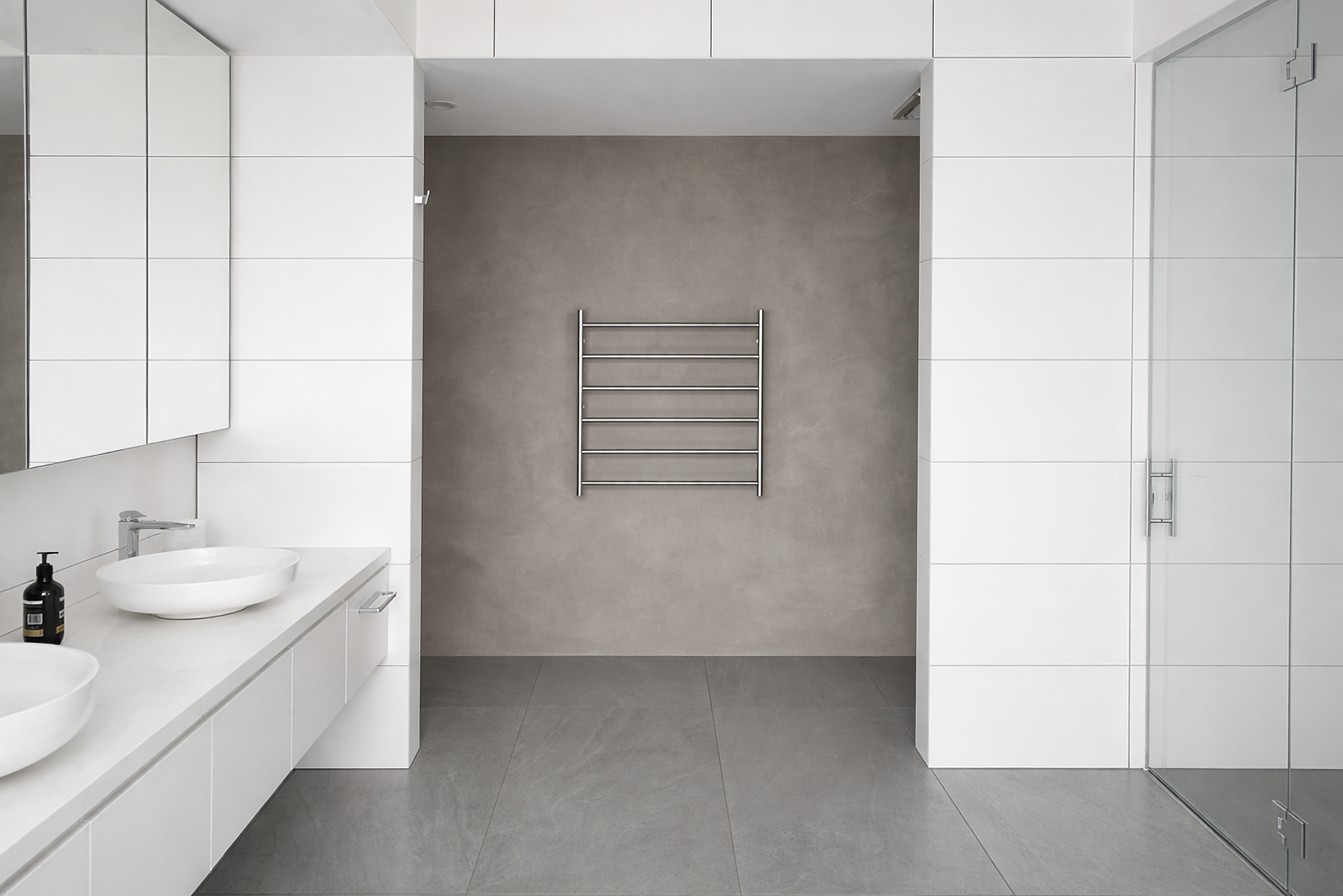 Minimal white bathroom with soft grey feature wall