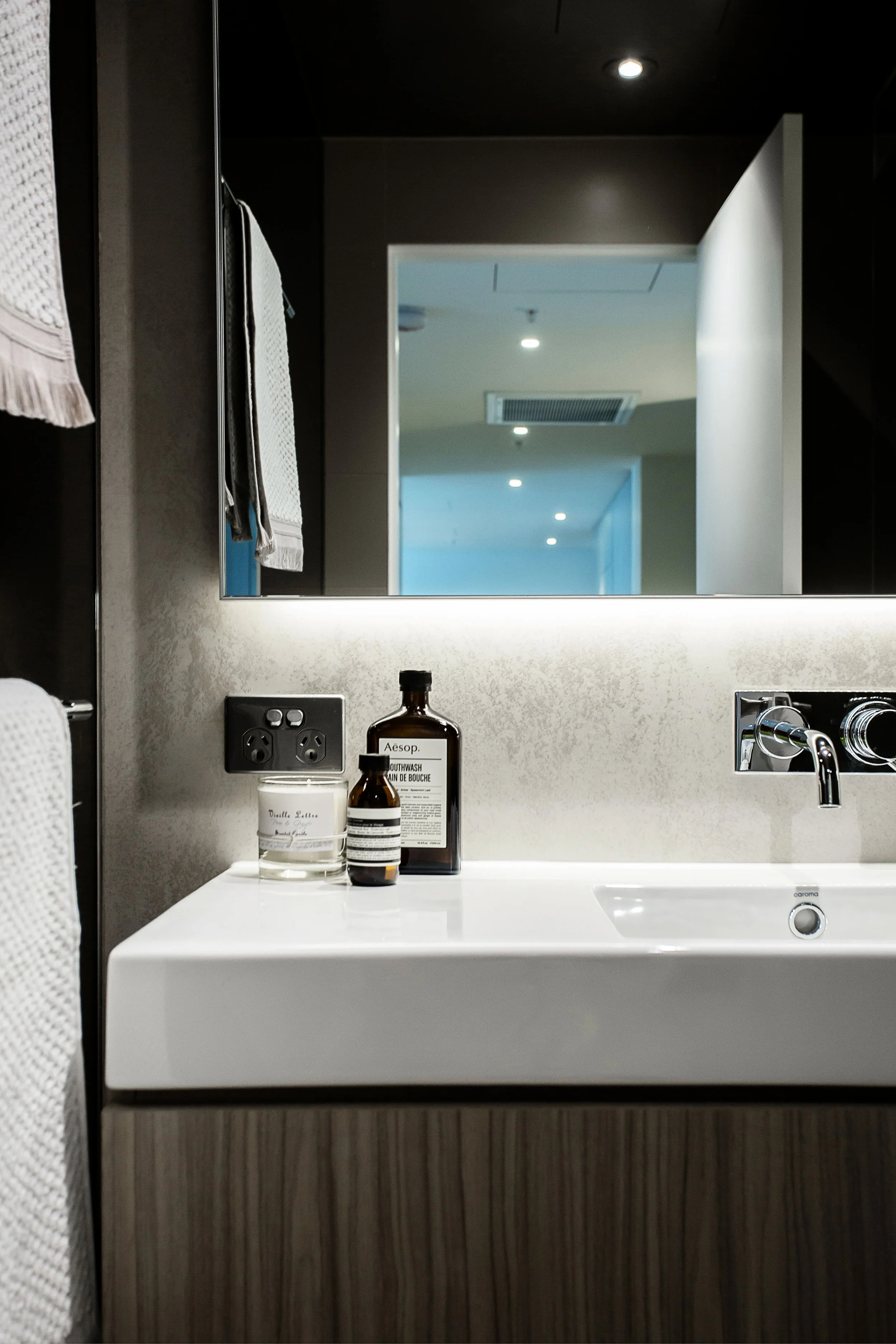 Bathroom styling detail in Forge Docklands Apartment 204 with curated accessories and modern fittings