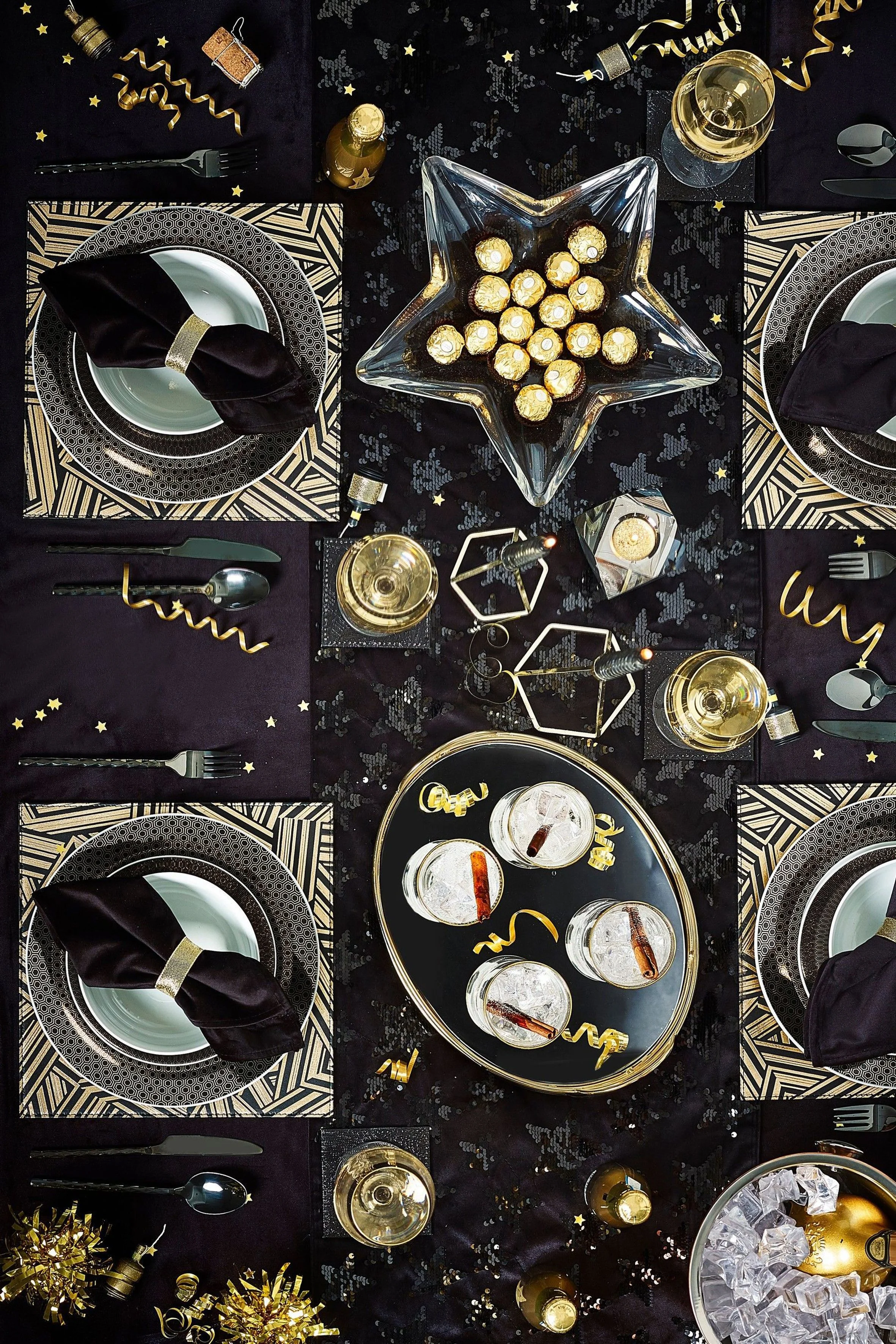 14. NEXT Star Embellished Velvet Table Runner from €31, Glitter Placemats and Coasters Set of 4 €28, 12 Piece Sloane Dinner Set €79