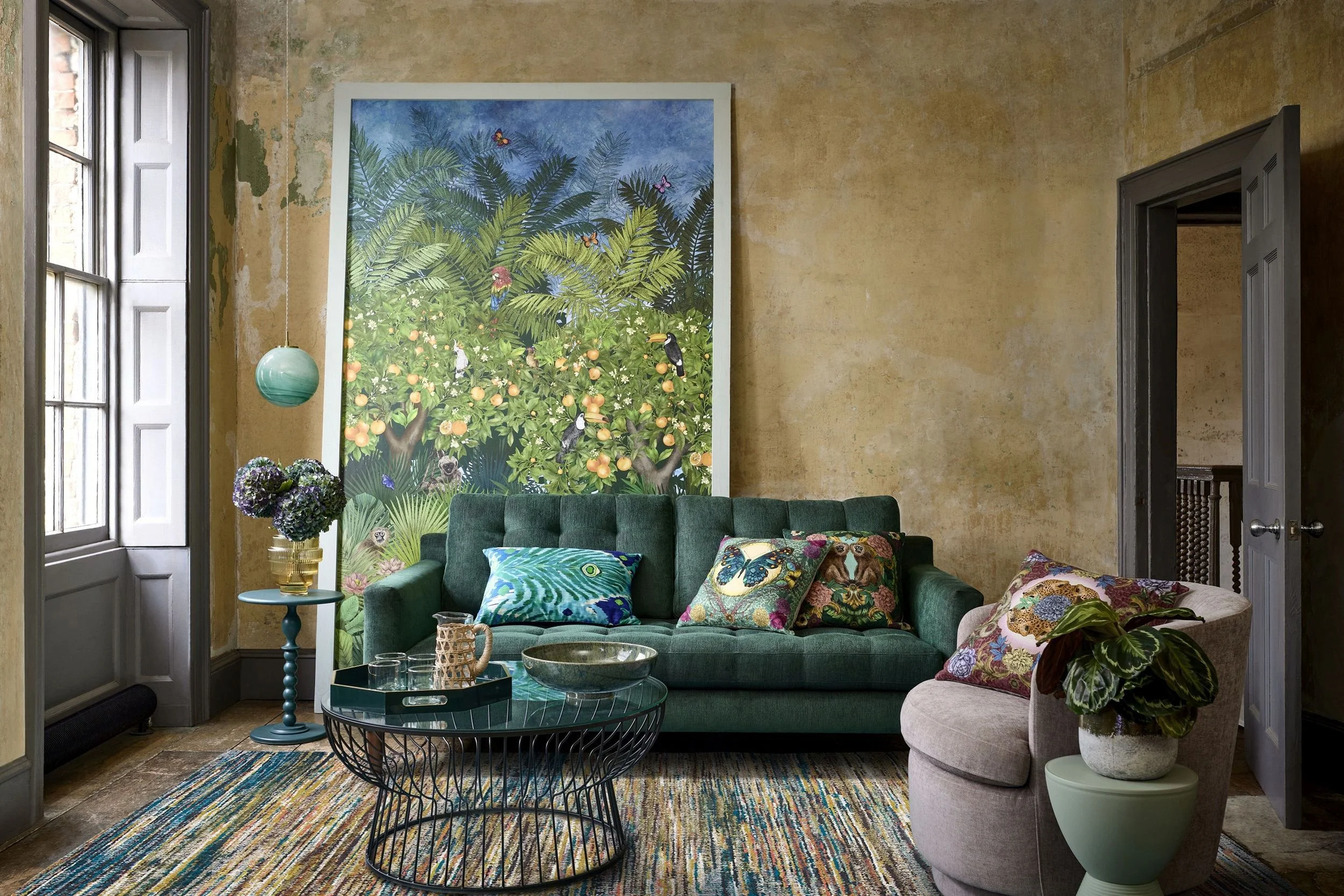 From Left, Peacock Ikat Cushion (Teal) €77.45, DNA Butterfly Cushion €59.57, DNA Monkey Cushion €59.57, DNA Leopard Cushion €59.57, Planets Single Pendant (Green) €113.19.