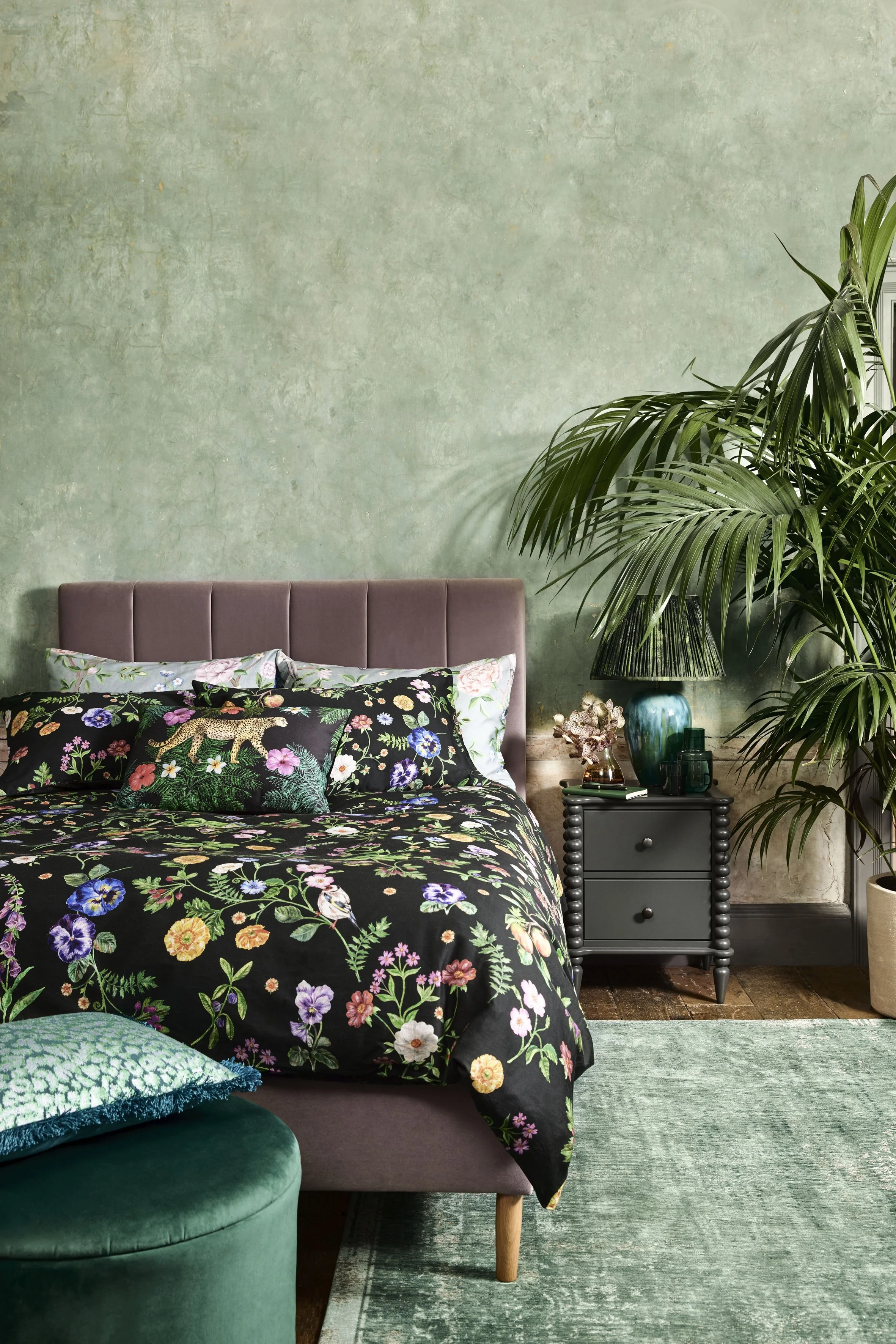 Hedgerow Dark Duvet Set €107.23, Enchanted Garden Duvet Set (pillows shown), €107.23, Reactive Glaze Lamp Base €148.94, Ellwood Pleated Shade €95.32, Wild Cat Cushion, €77.45,