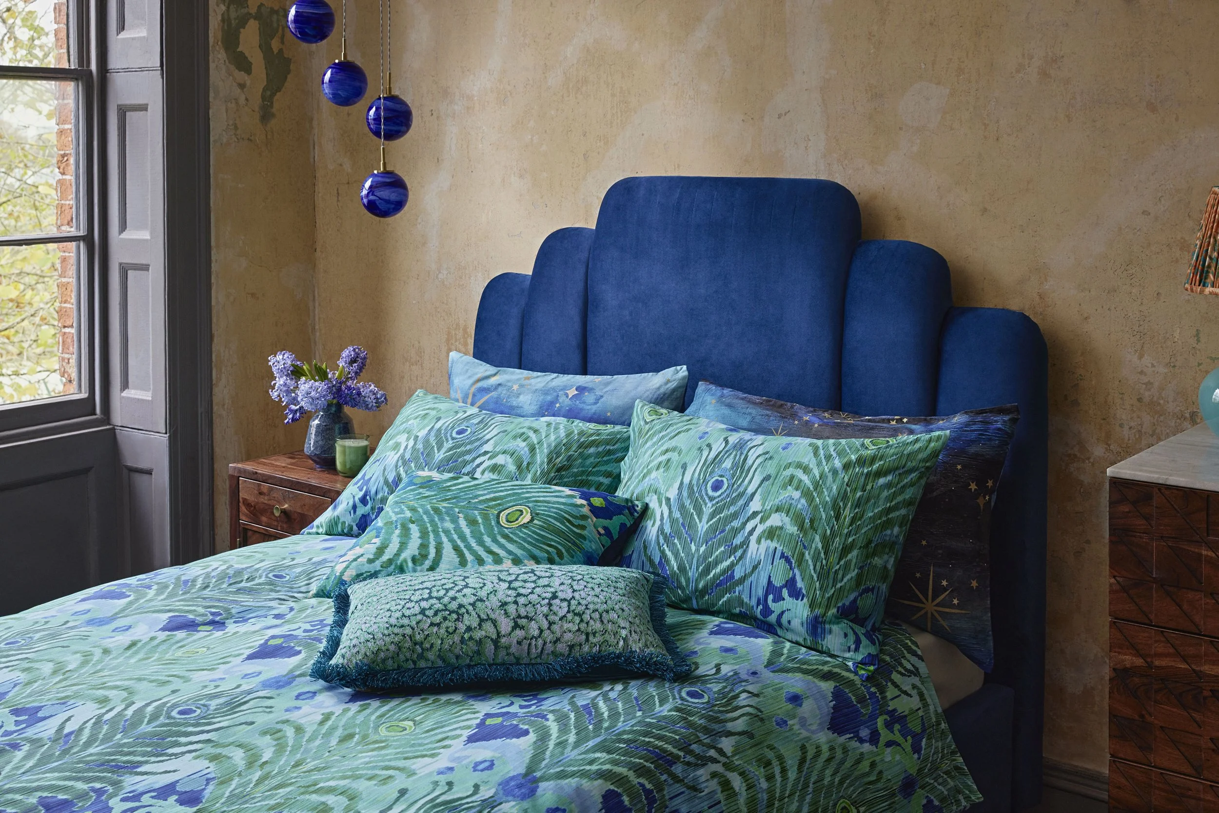 Majestic Peacock Blue Duvet Set €107.23, Celestia Duvet Set (pillows shown) €107.23 Curvaceous Lamp Base (Teal) €102.78, Peacock Ikat Shade (Orange) €59.57, Planets 5 Light Pendant (Blue) €148.94, ,