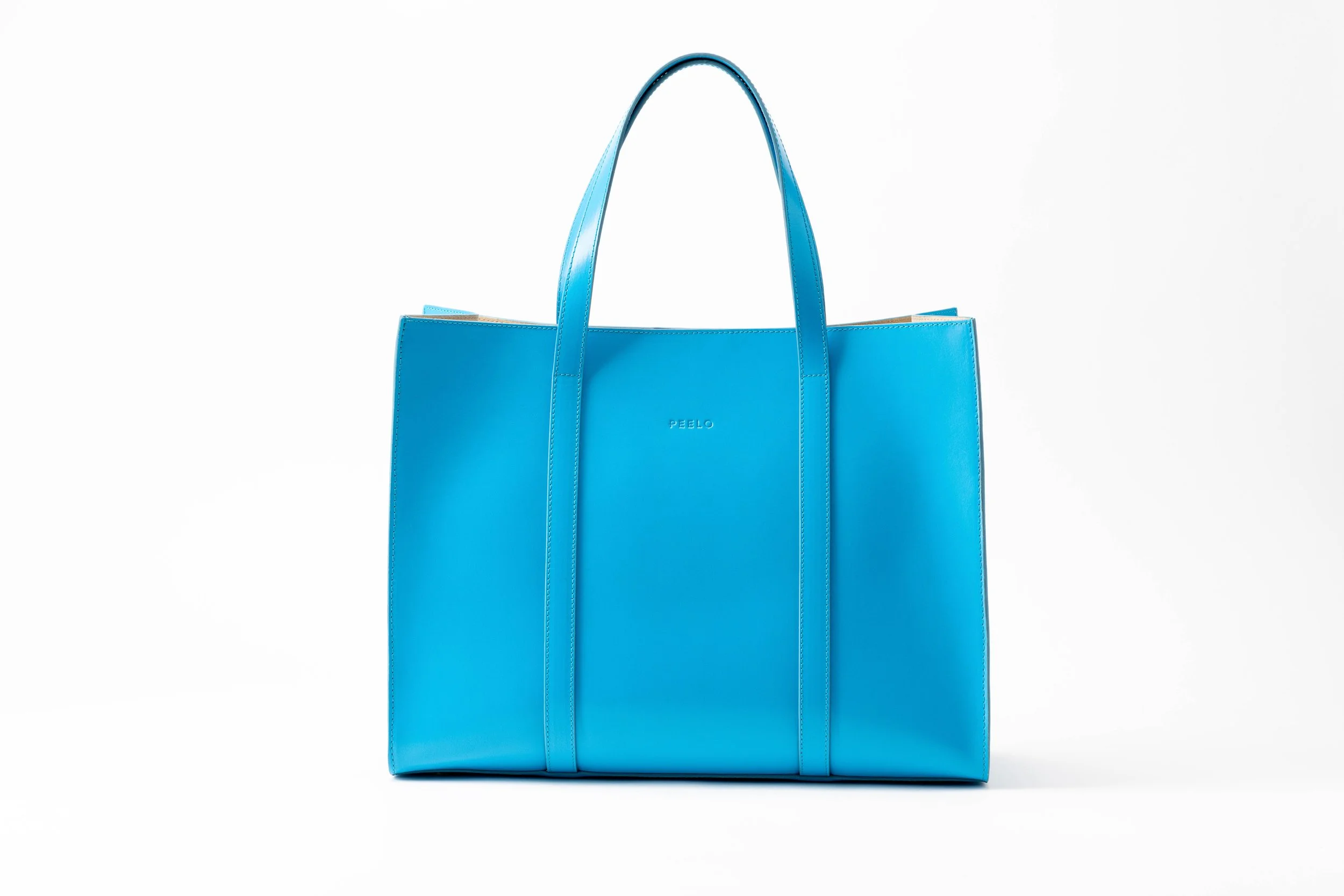 Peelo Large Ibiza Blue Tote Bag €295, visit 