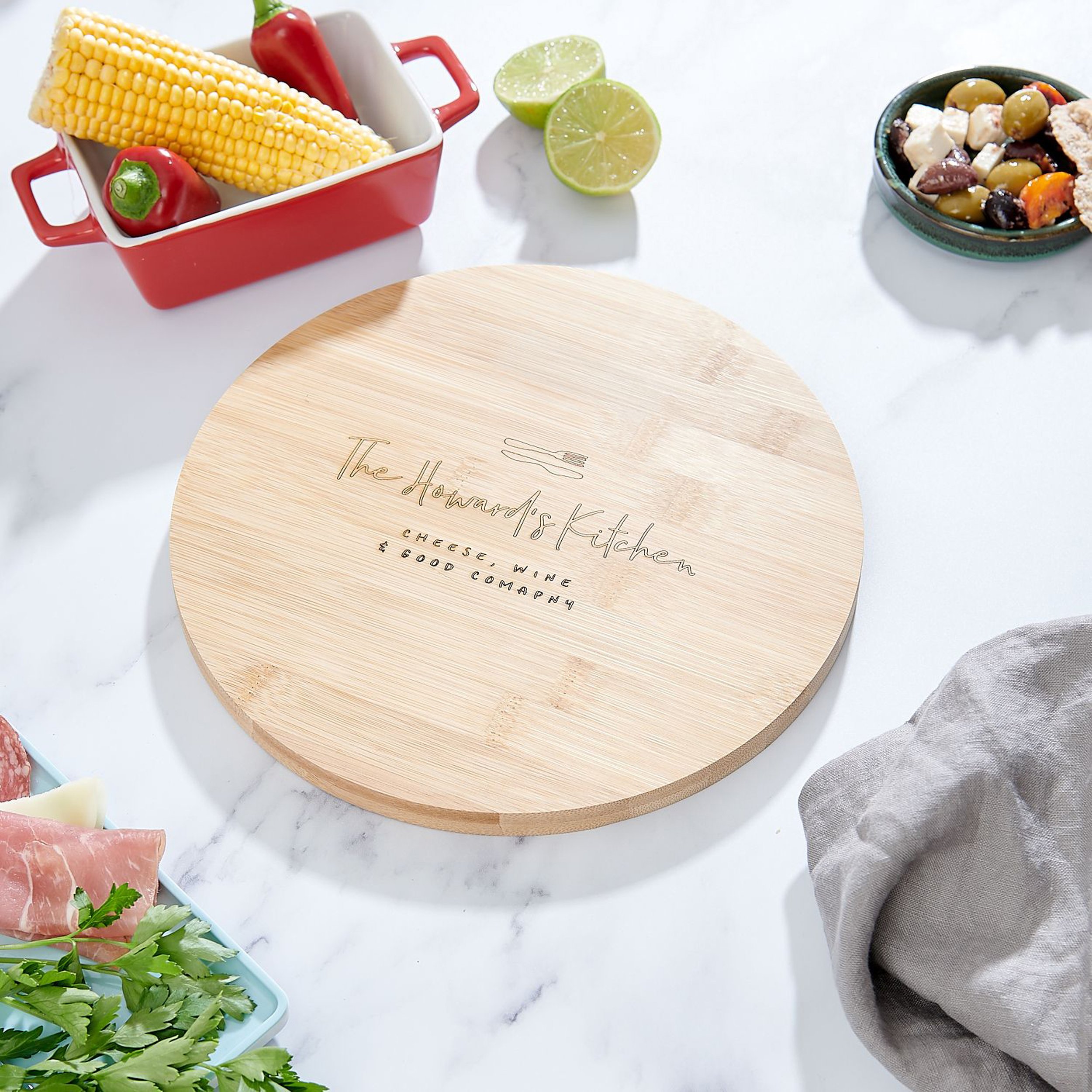 7. Personalised Wooden Family Cheeseboard €30.64, 