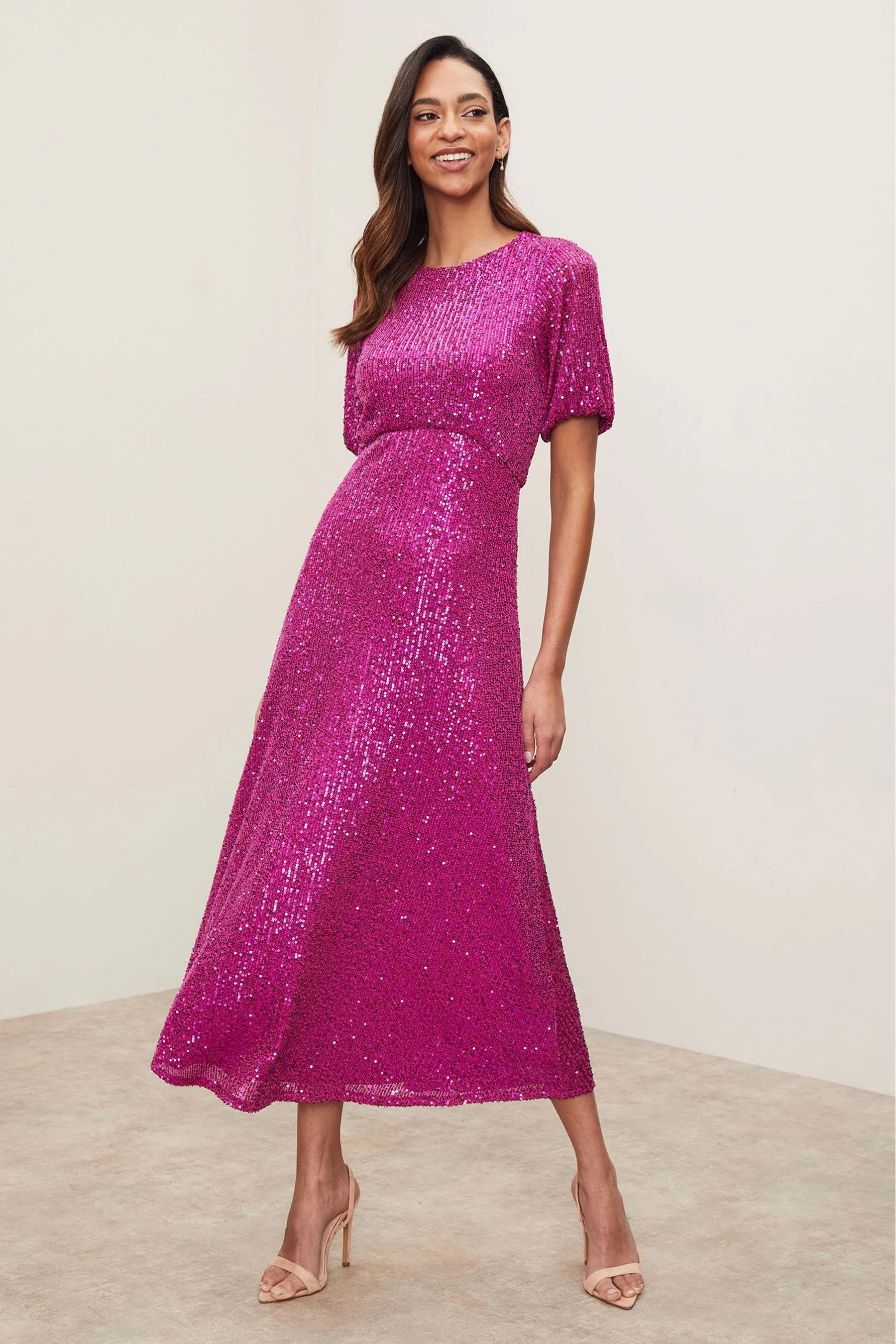 1.LIPSY Short Sleeve Sequin Midi Dress €86, 