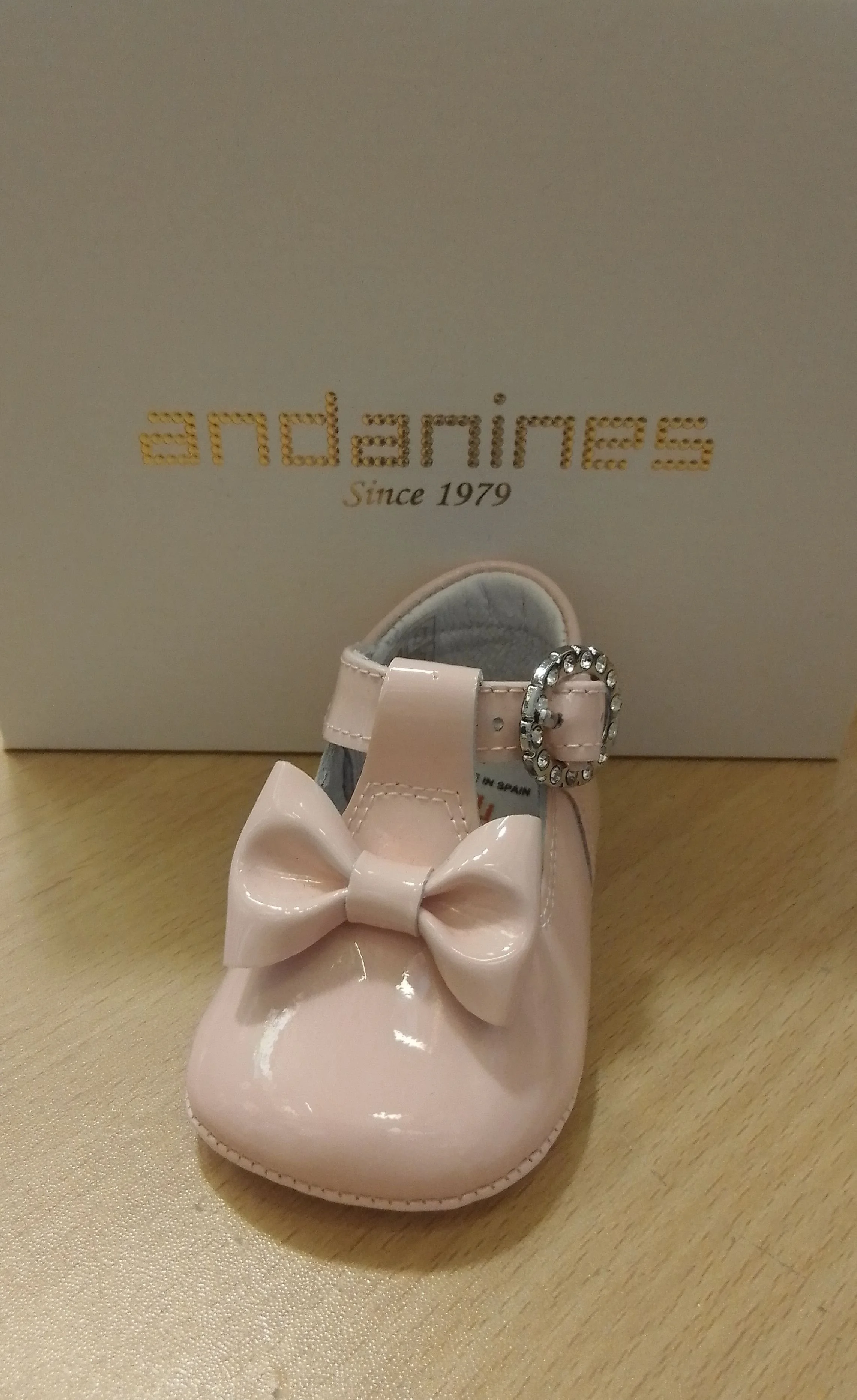 Andanine pink bow T-bar patent shoes