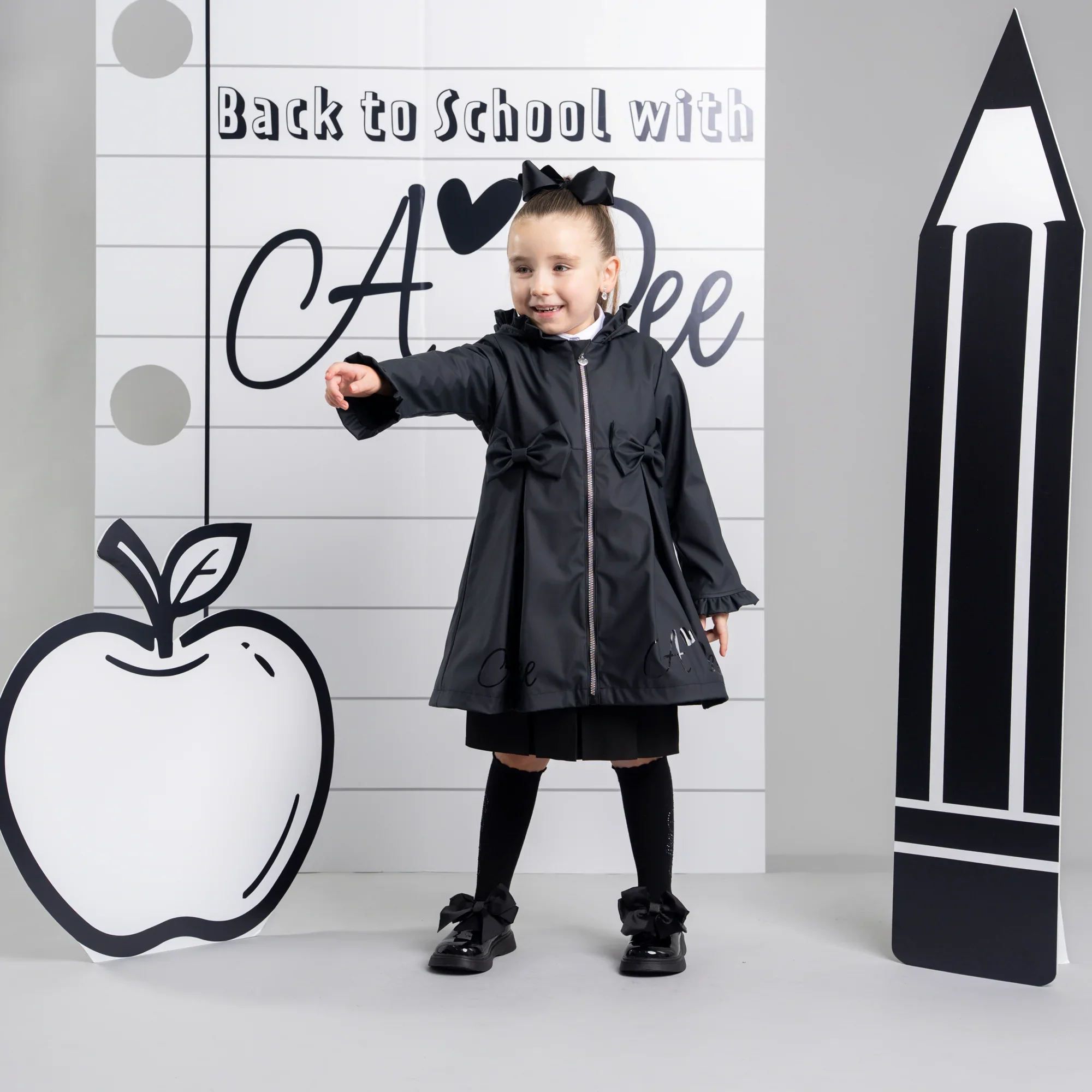 A_Dee_Girls_Black_Raincoat_W266203_BLACK_AW26.webp
