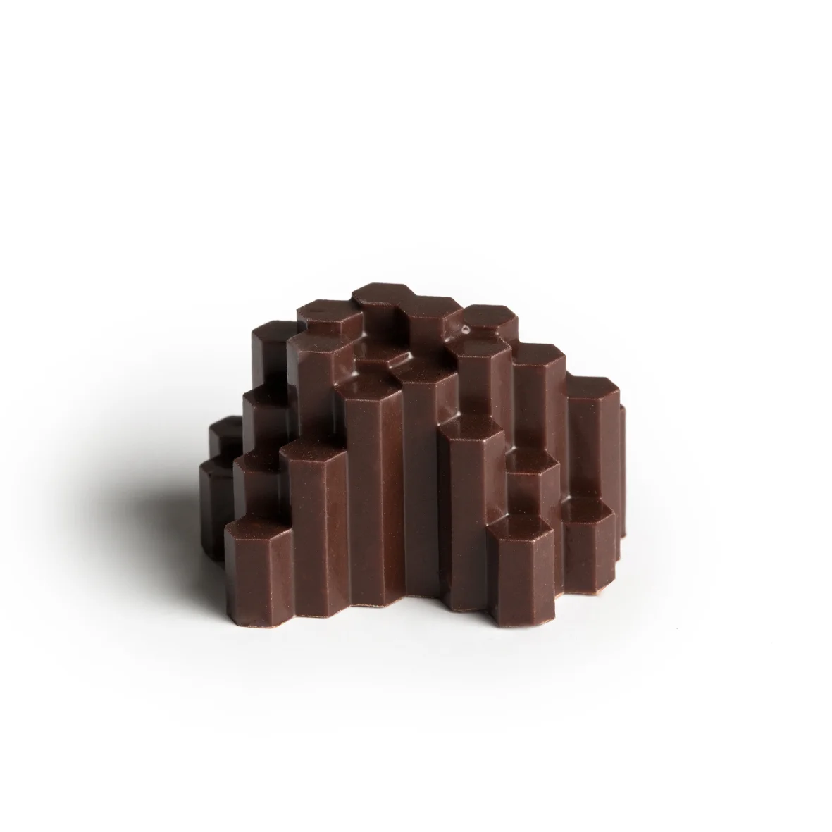 Five-year-aged mandarin rind Aged mandarin rind, a popular ingredient used in cooking and medicine, combined with bitter dark chocolate creating firm citrusy ganache filling with a zest.