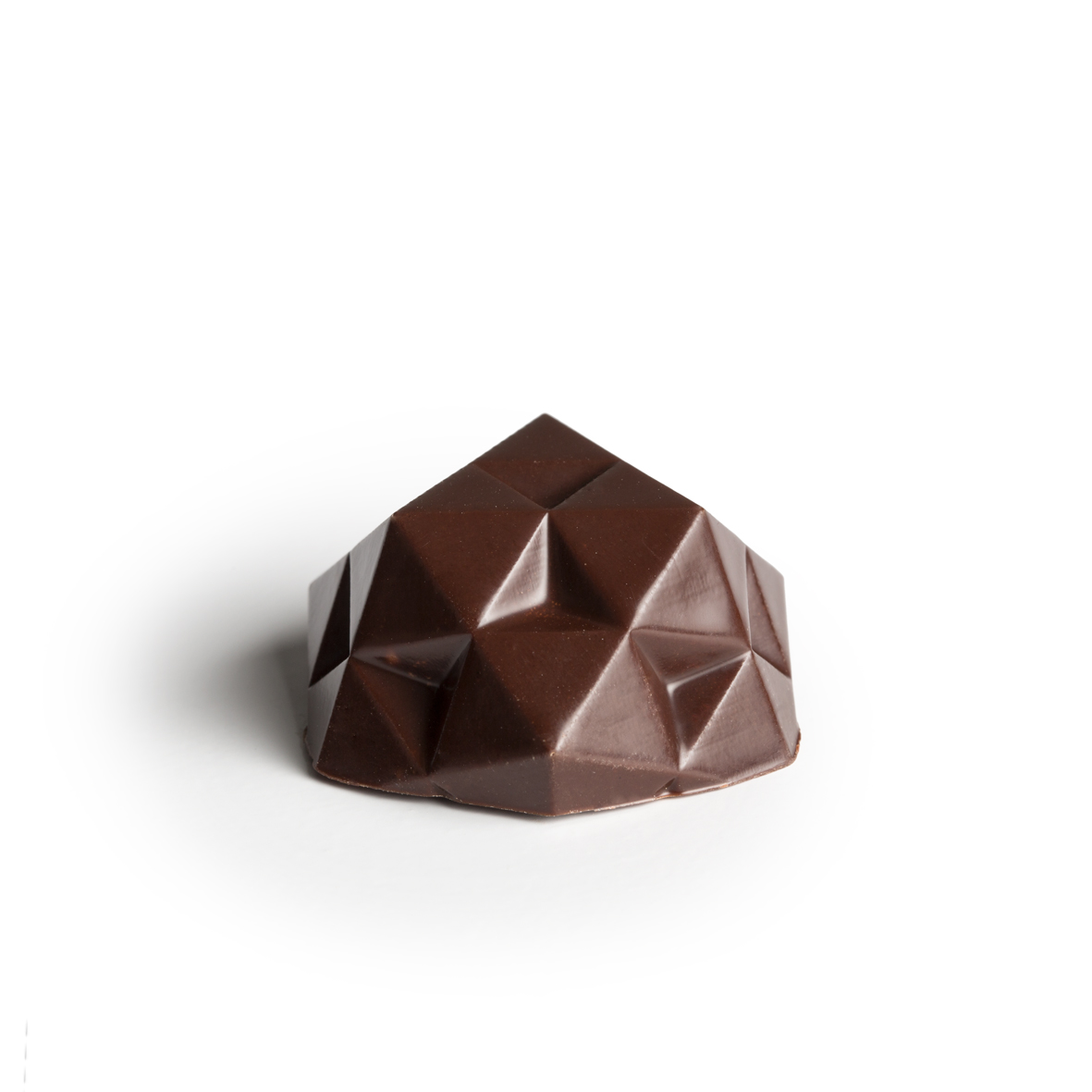 Red bean & milk chocolate One of the most popular dessert ingredient in Hong Kong, red bean has a subtle earthy flavour offset with its sweetness, paired with a milk chocolate ganache with caramel notes.