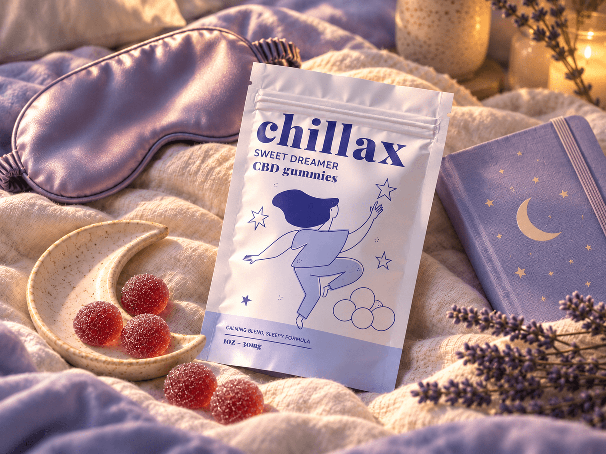 Chillax Sweet Dreamer CBD gummy packaging surrounded by lavender, a satin sleep mask, red gummies, and a crescent moon dish in a cozy nighttime setting.