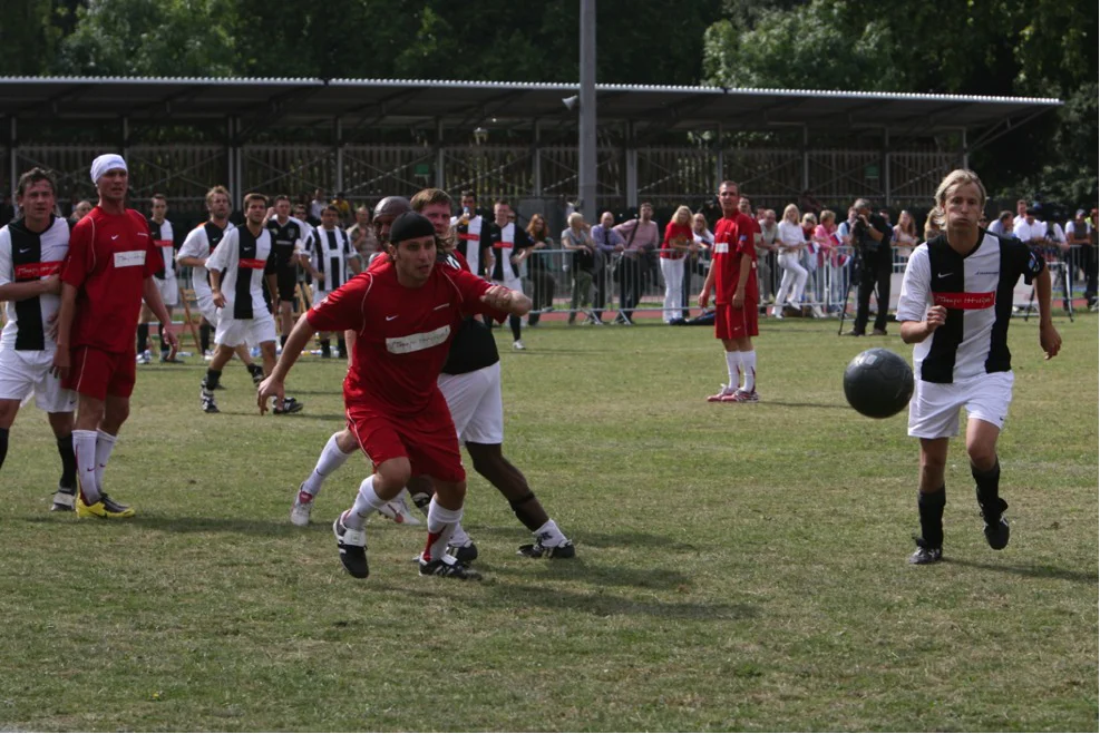 On the Russian team, fashion designer Denis Simachev excelled in defence, whilst some impeccable heading skills were demonstrated by siblings Sergei and Vladimir Kristovsky from pop group Umaturman; actor and TV presenter Igor Vernik initiated numerous goal attacks from midfield, ably supported by singer Maksim Pokrovsky; Roman Kostomarov, Olympic figure-skating champion, was unrelenting on the right wing, whilst Konstantin Eremenko, President of Dinamo Football Club, led the attack from the front; restaurateur Stepan Mikhalkov was always hot on the ball, and Anton Troyanov, Director of the St. Petersburg gave a master-class in dribbling.