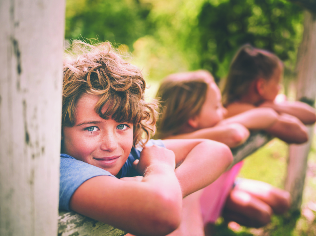 high res kids on fence.jpeg