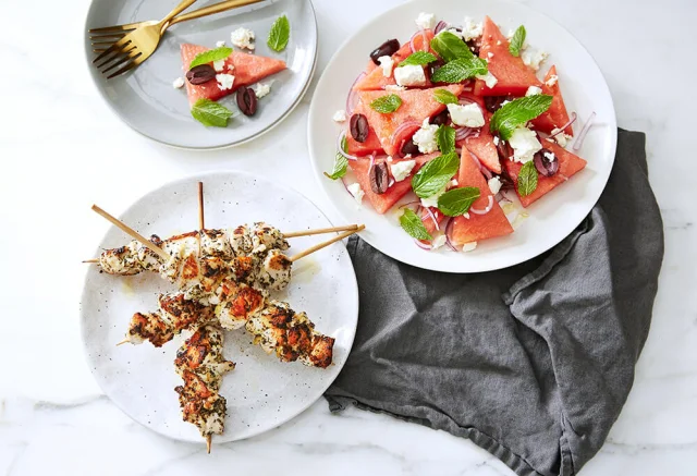 Garlic and oregano chicken skewers with watermelon salad