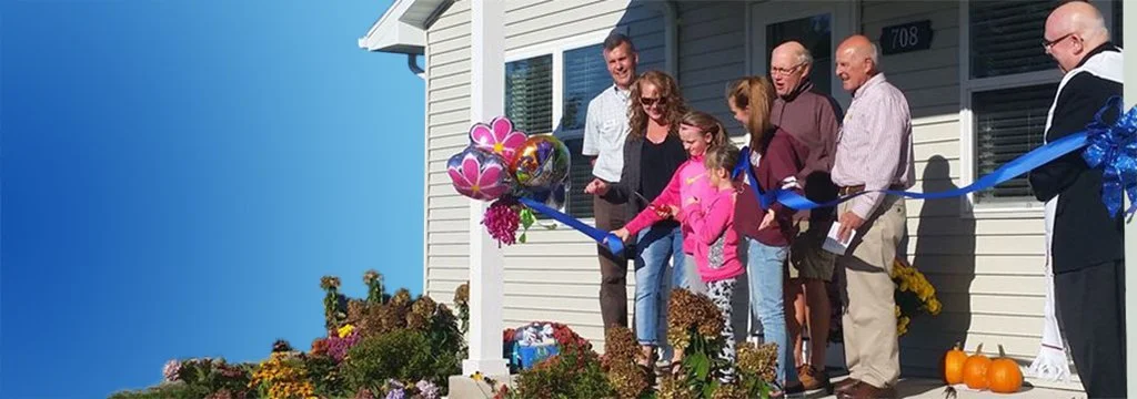 Door County New-Home-ribbon-cutting.jpg