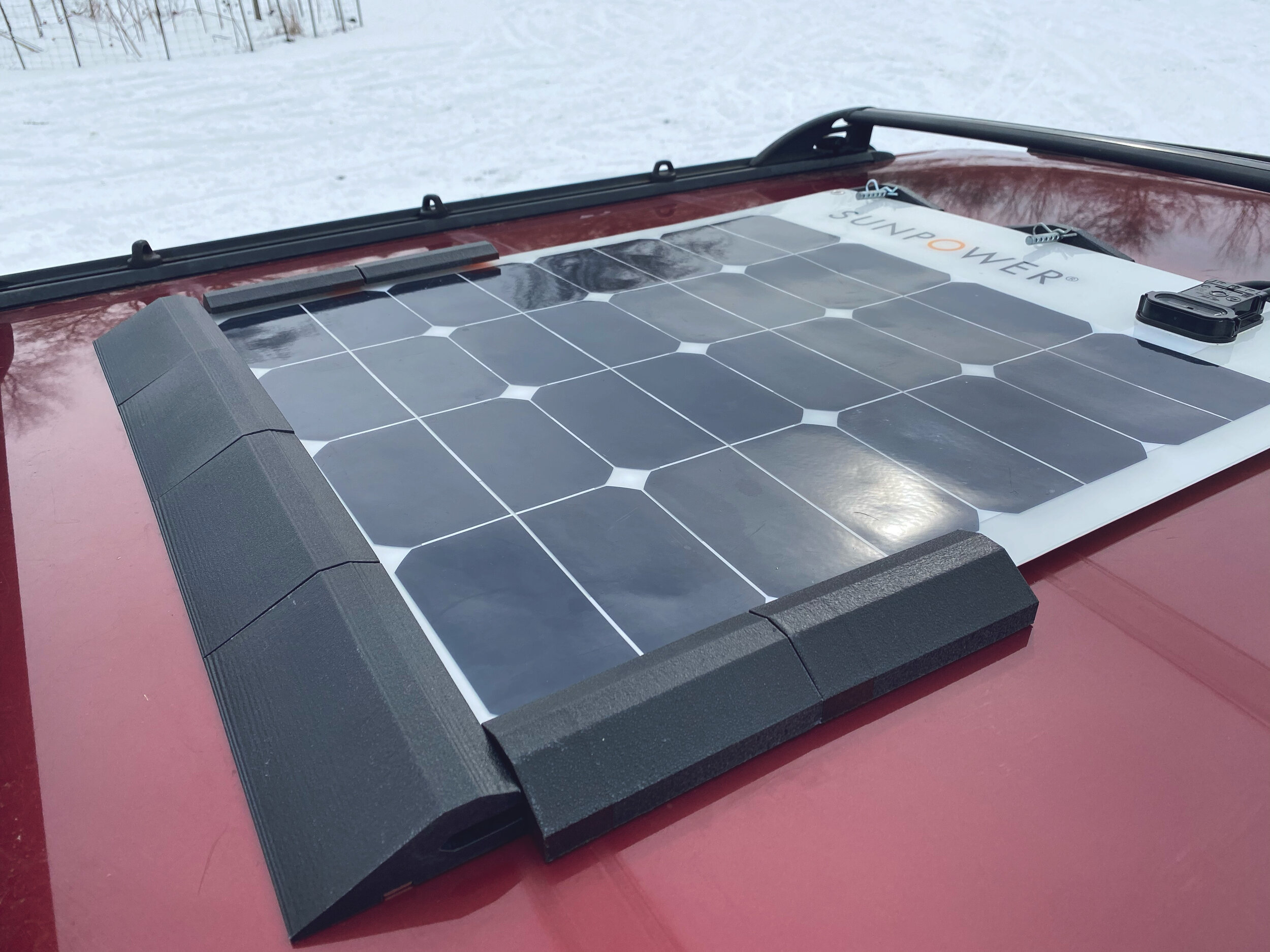 Flexible solar panel and mounting system in snowy conditions