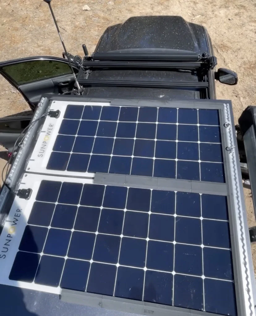 Tacoma truck rooftop tent removeable flexible solar panel mounts
