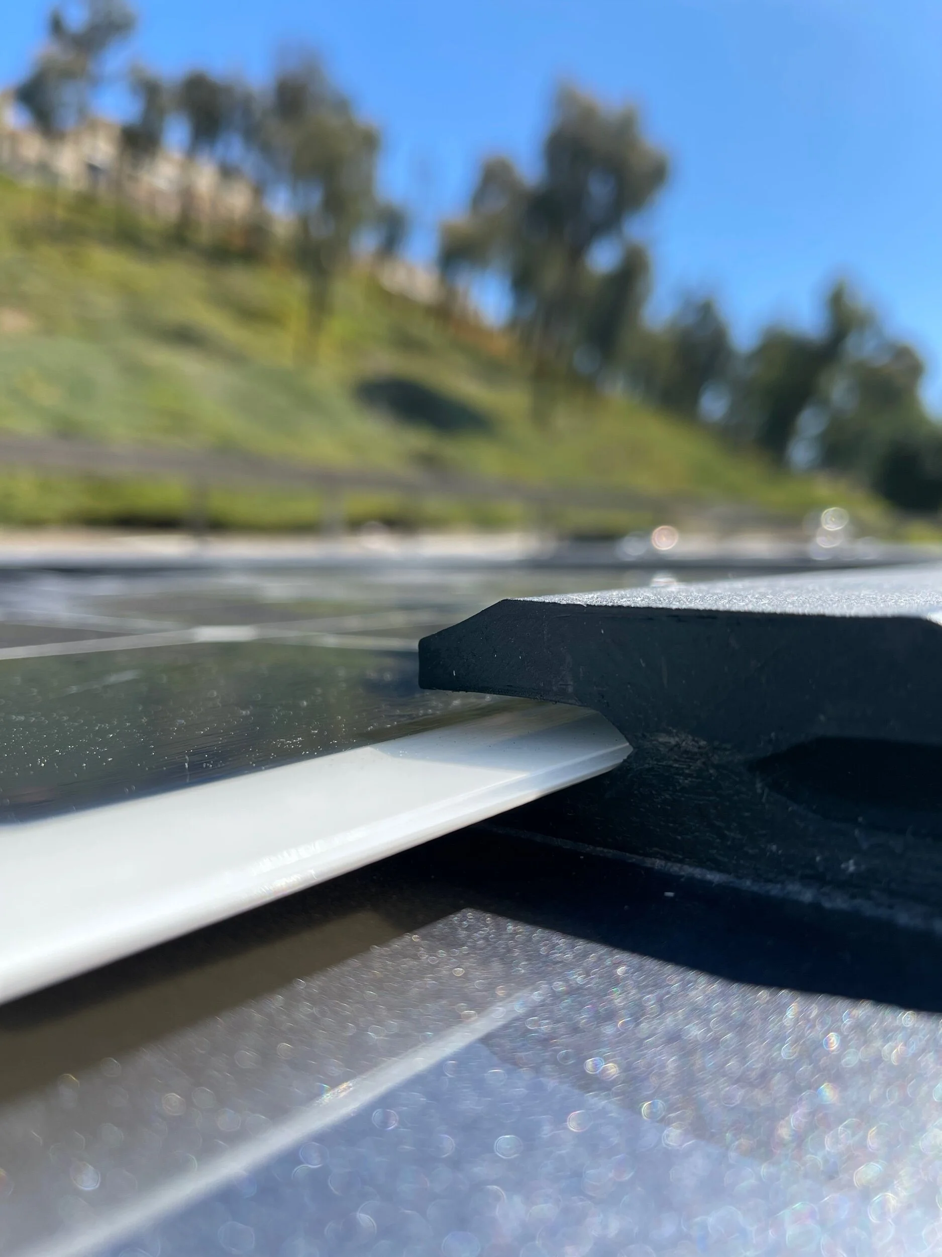 Flexible solar panel track mounts