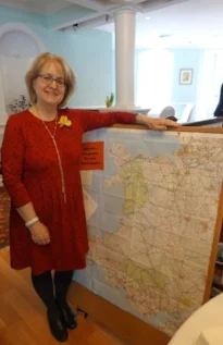 WSWNE President Susan Davies Sit, with our Welsh map of members' Welsh roots.