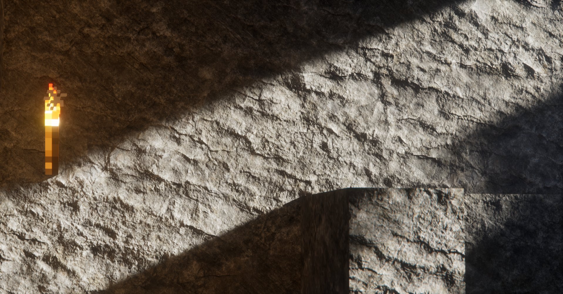 A textured stone wall with a small wall-mounted light fixture emitting warm light.