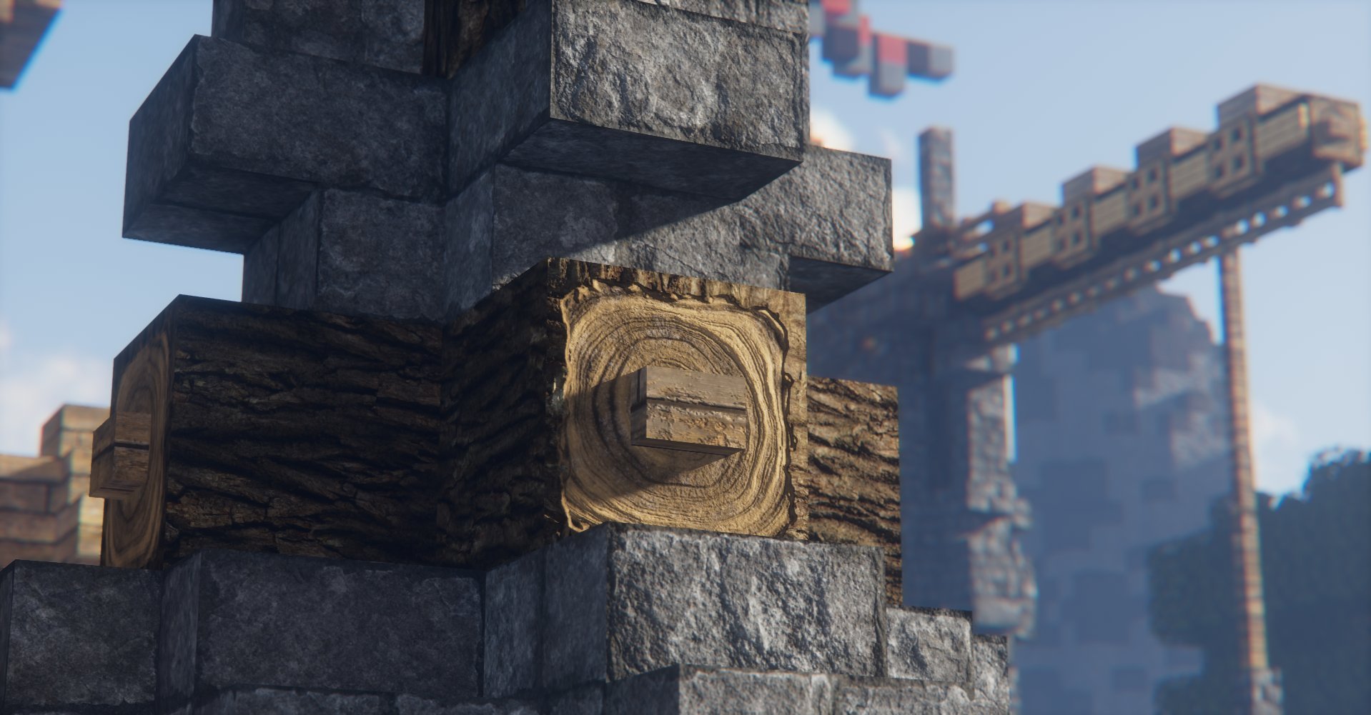 Close-up of stone and wood bricks in construction, with a crane in the background during daytime.