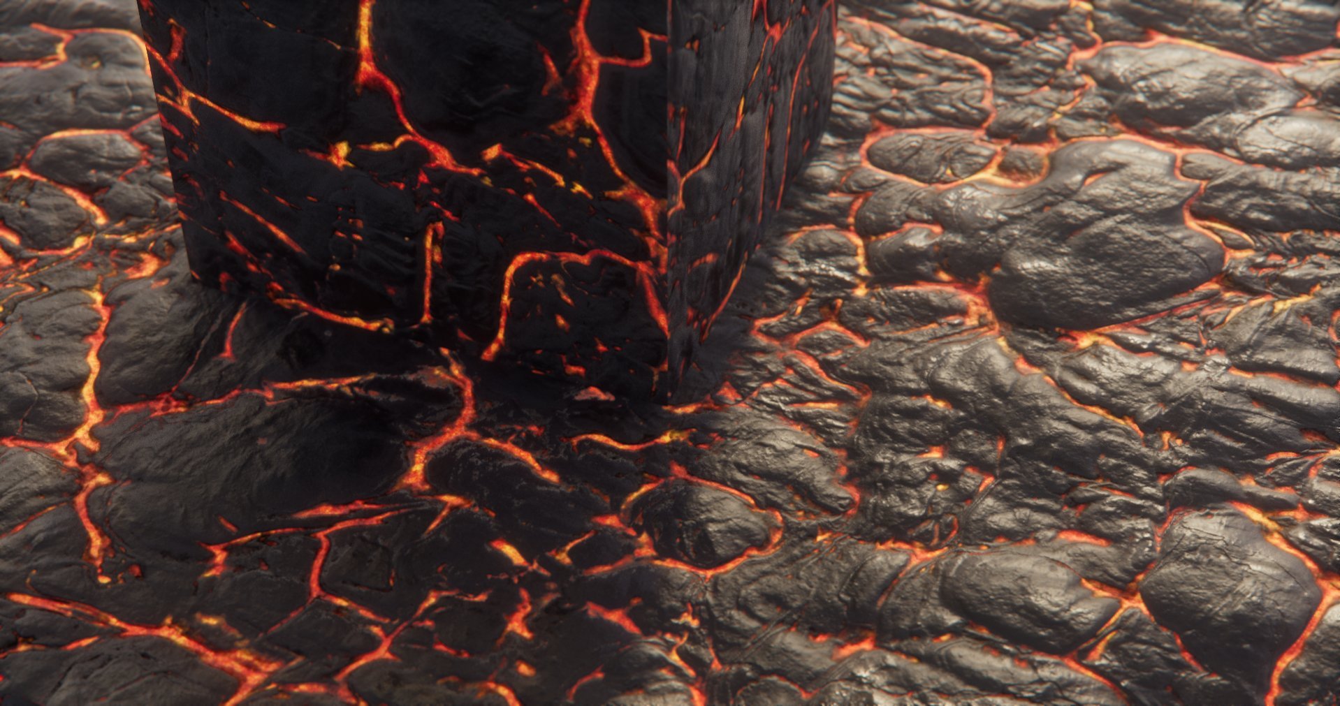 A close-up of a large rectangular block of solidified lava with glowing orange cracks, set on a surface of cooled, hardened lava with similar glowing cracks.