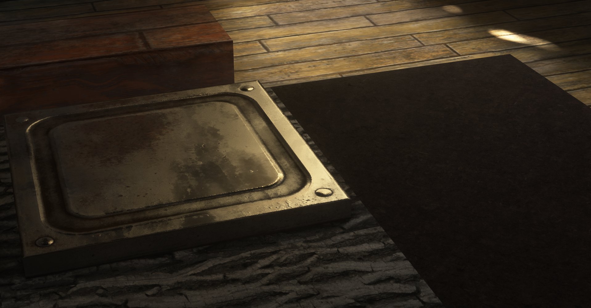 Close-up of a worn, metallic rectangular object on a wooden and stone surface, with a dark background.