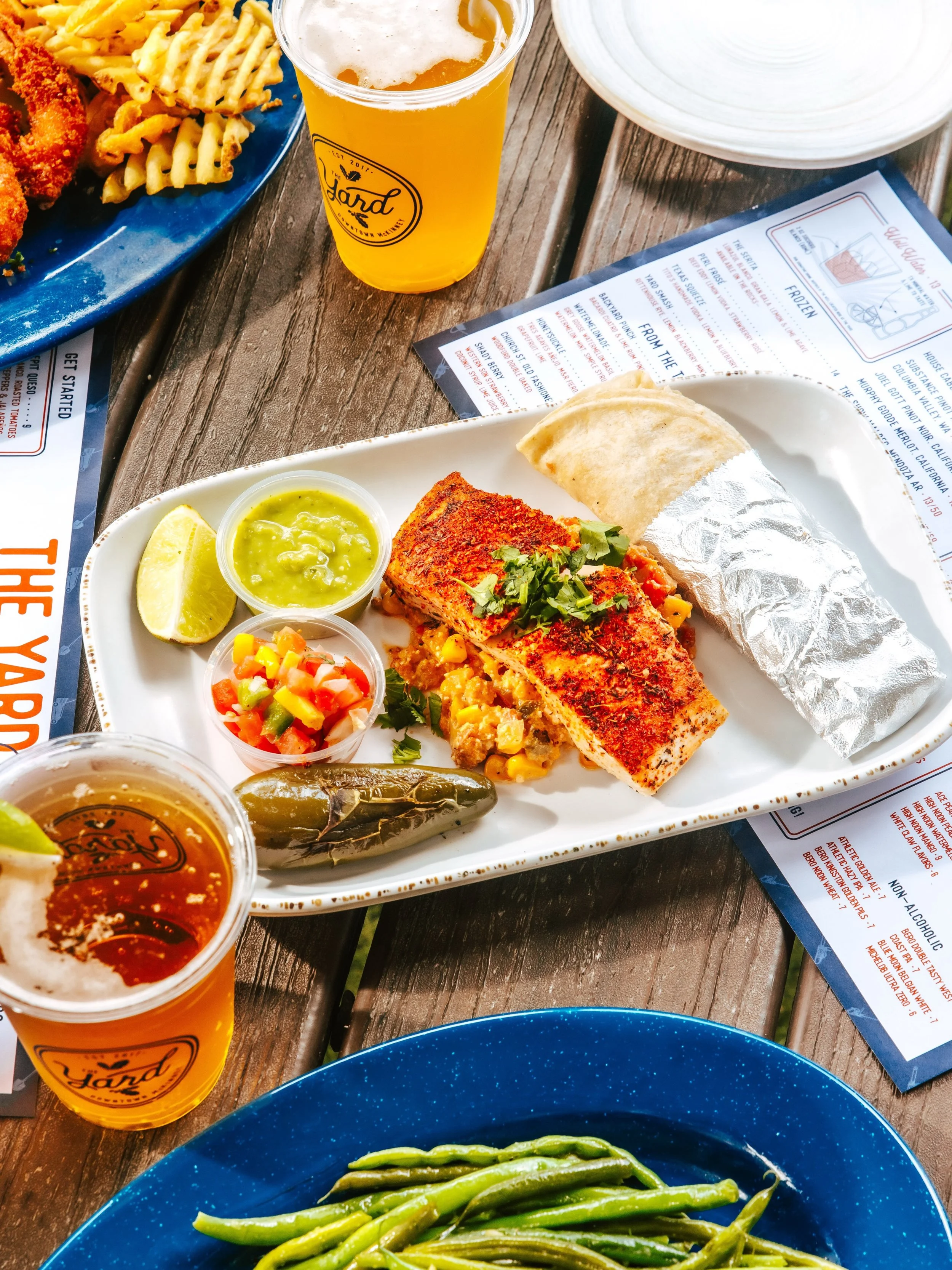 Lunch break in Downtown McKinney. Order&rsquo;s simple: something cold, something good. Patio lunch and cold drinks on the square at The Yard.

Pictured: BLACKENED MAHI TACO PLATE
cauliflower elote, tomatillo salsa, roasted jalape&ntilde;o, mango pic