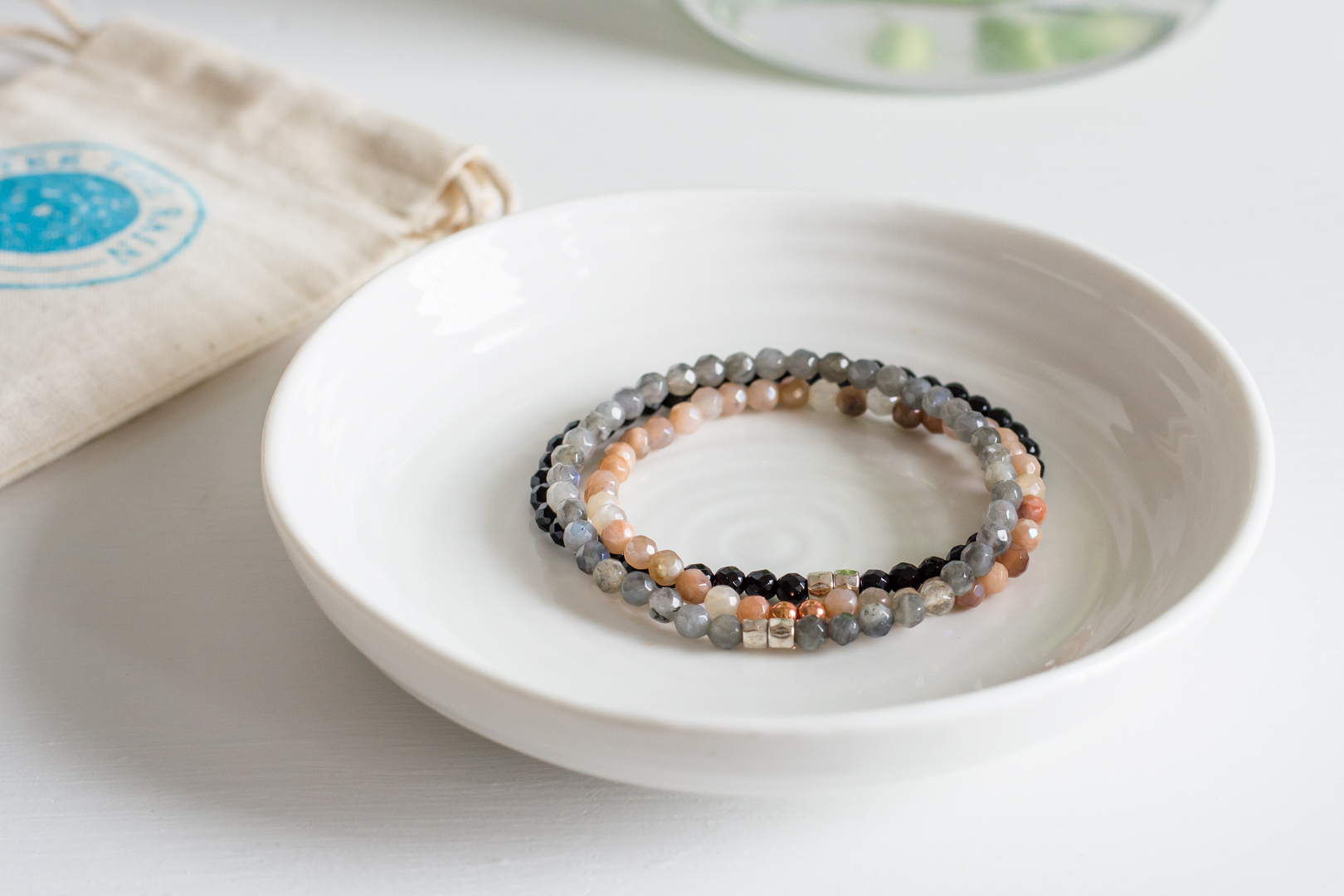 Delicate Gemstone energy bracelets stack.jpg