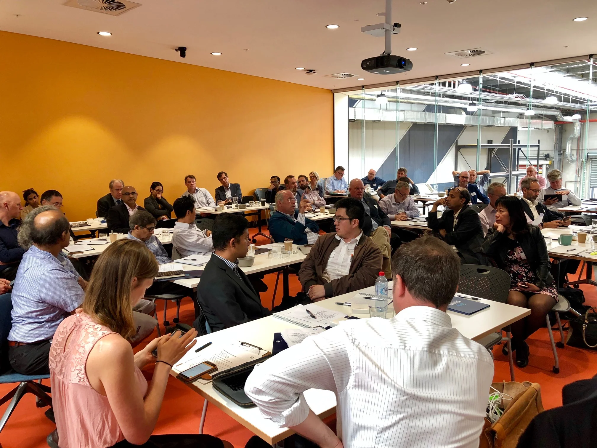 Workshop delegates engaging in debate on innovative approaches to critical water pipe leaks and bursts