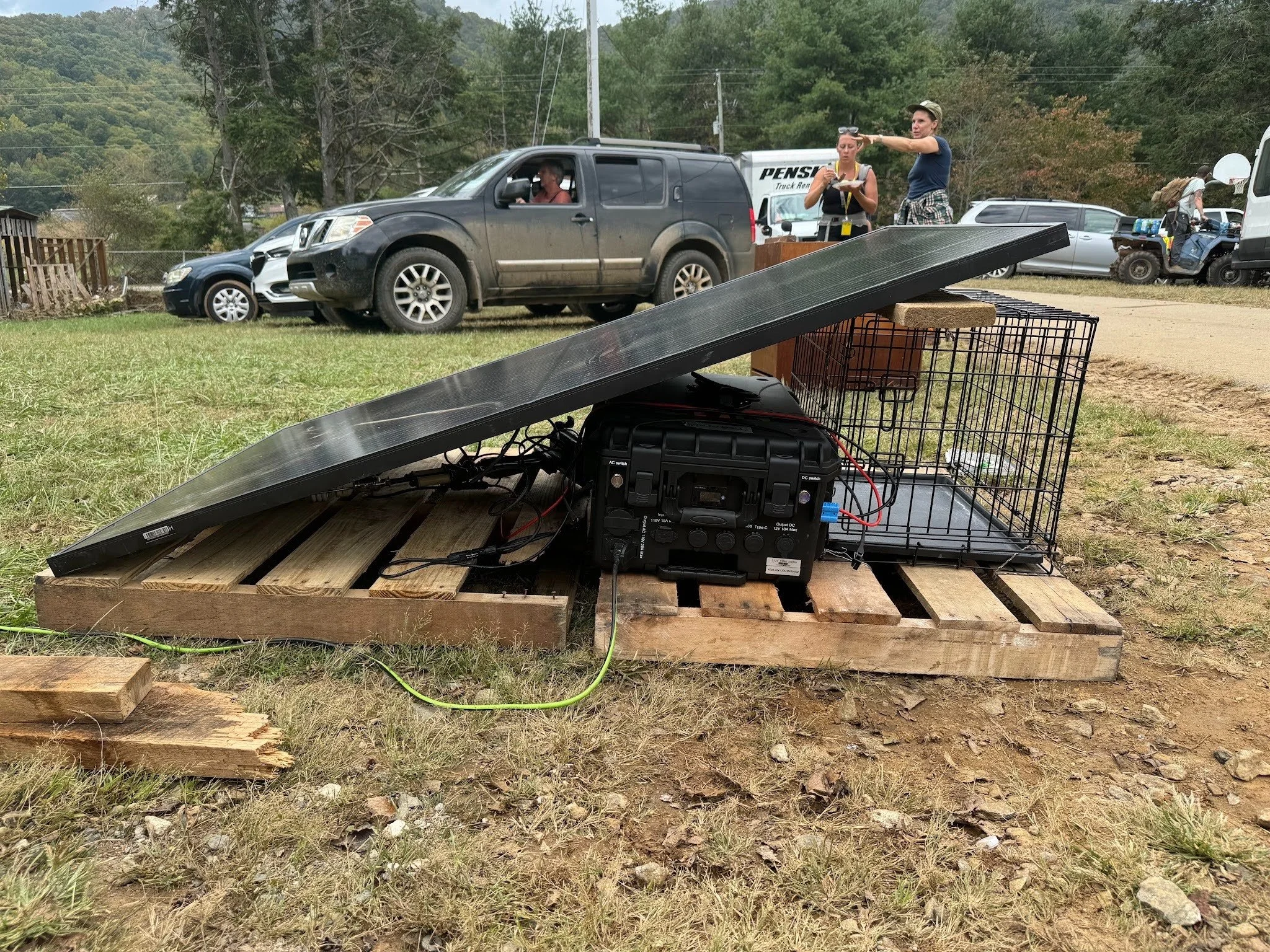 solar panel on battery and ground.jpg