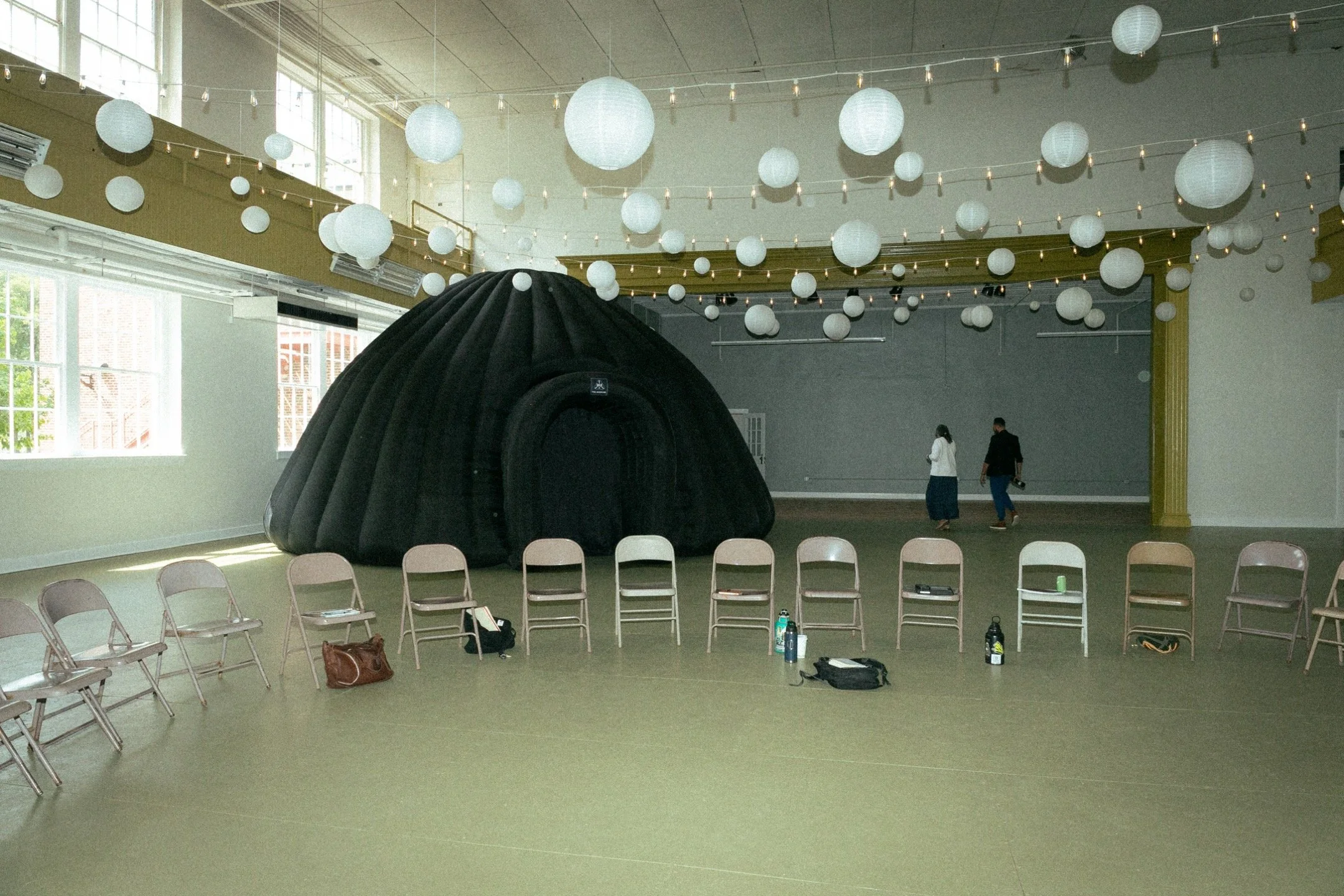 Event space at Marshall High Studios set up with chairs for a discussion.
