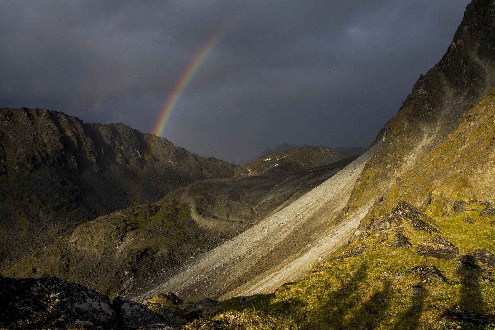 rainbow in alaska mountains