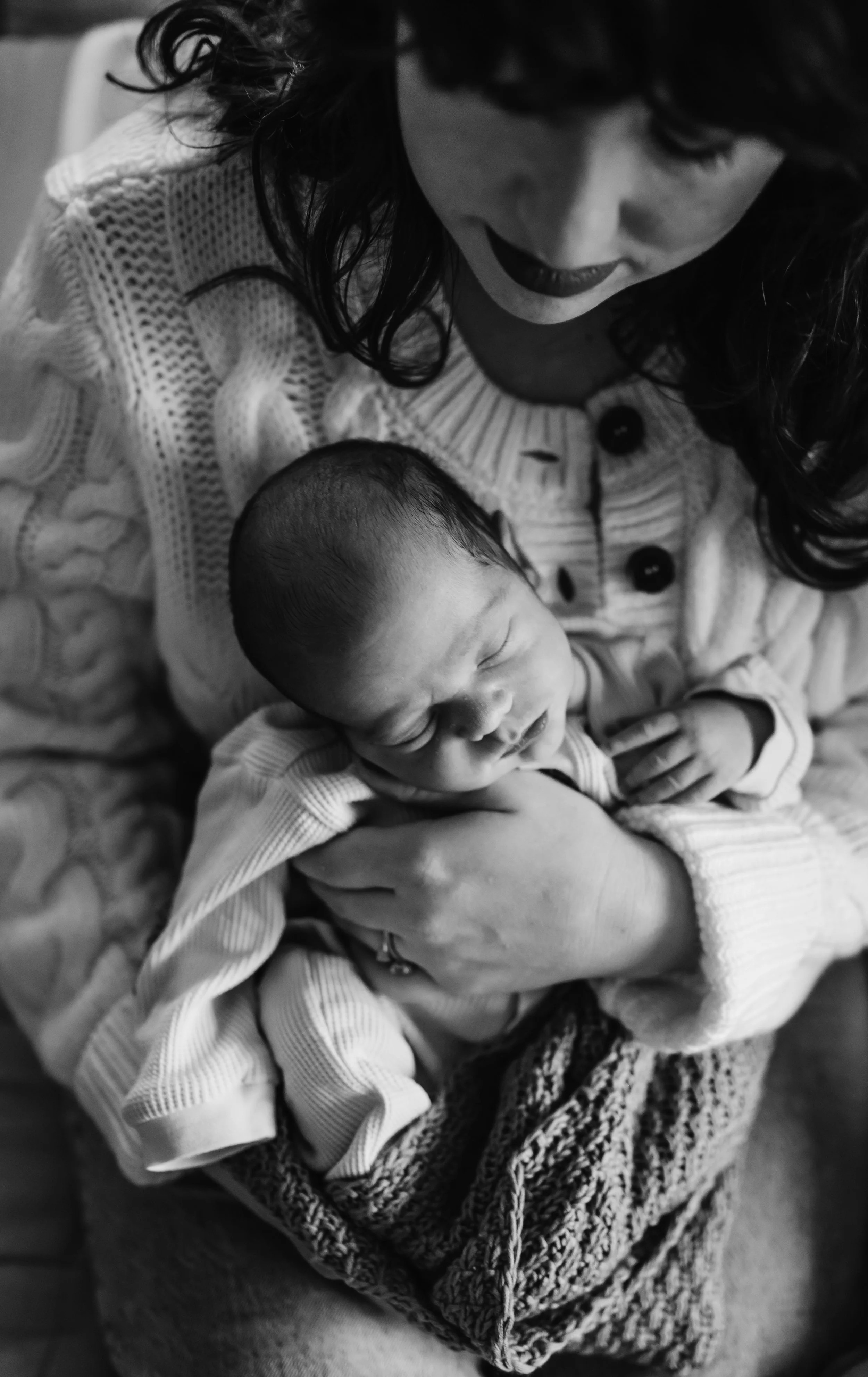 Mom holding newborn baby