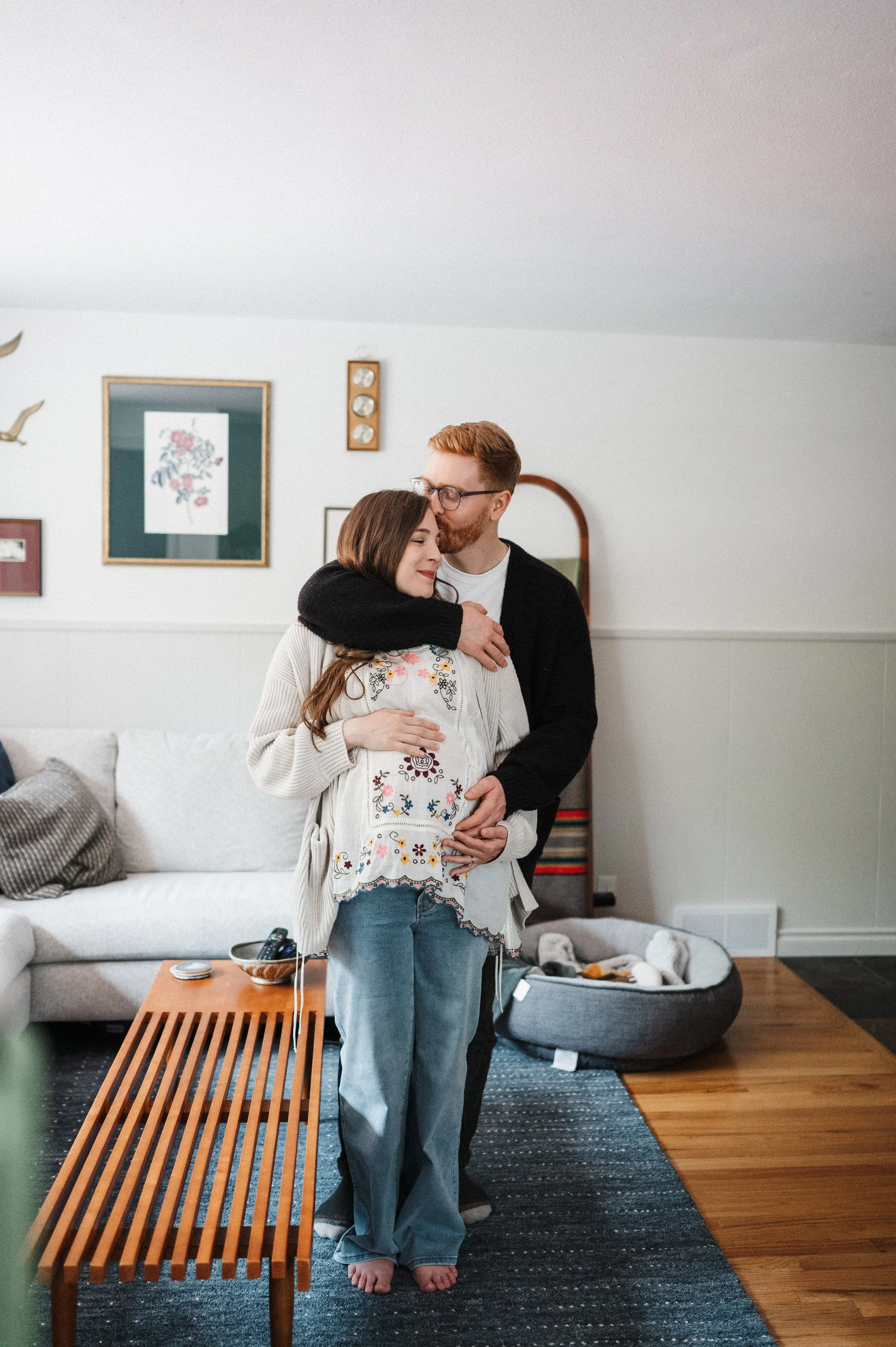parents to be standing together in living room