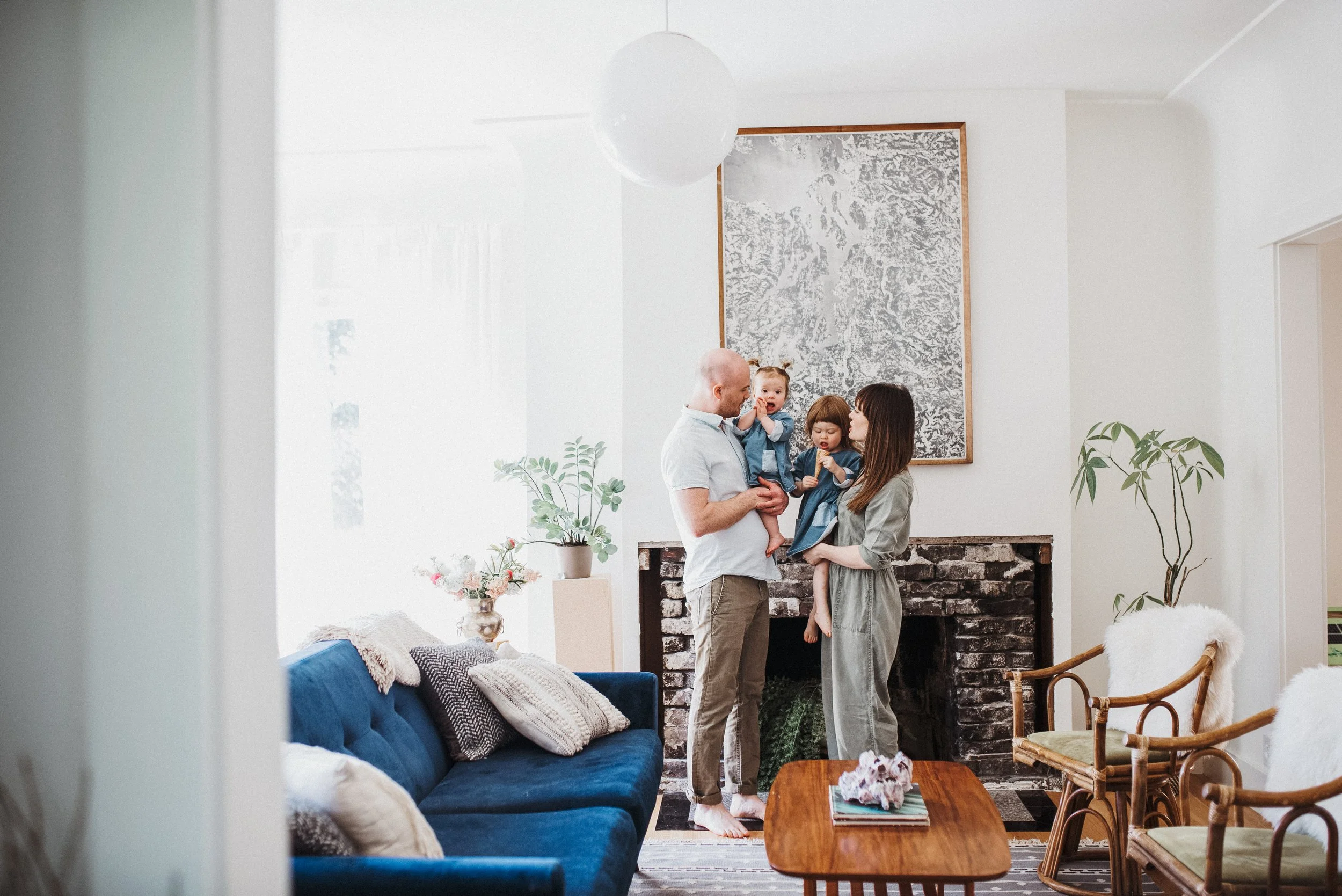 Seattle family of four standing in living room